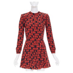 SAINT LAURENT 2012, miniabito nero in seta con motivi geometrici a blocchi e spalline imbottite, FR34 XXS
