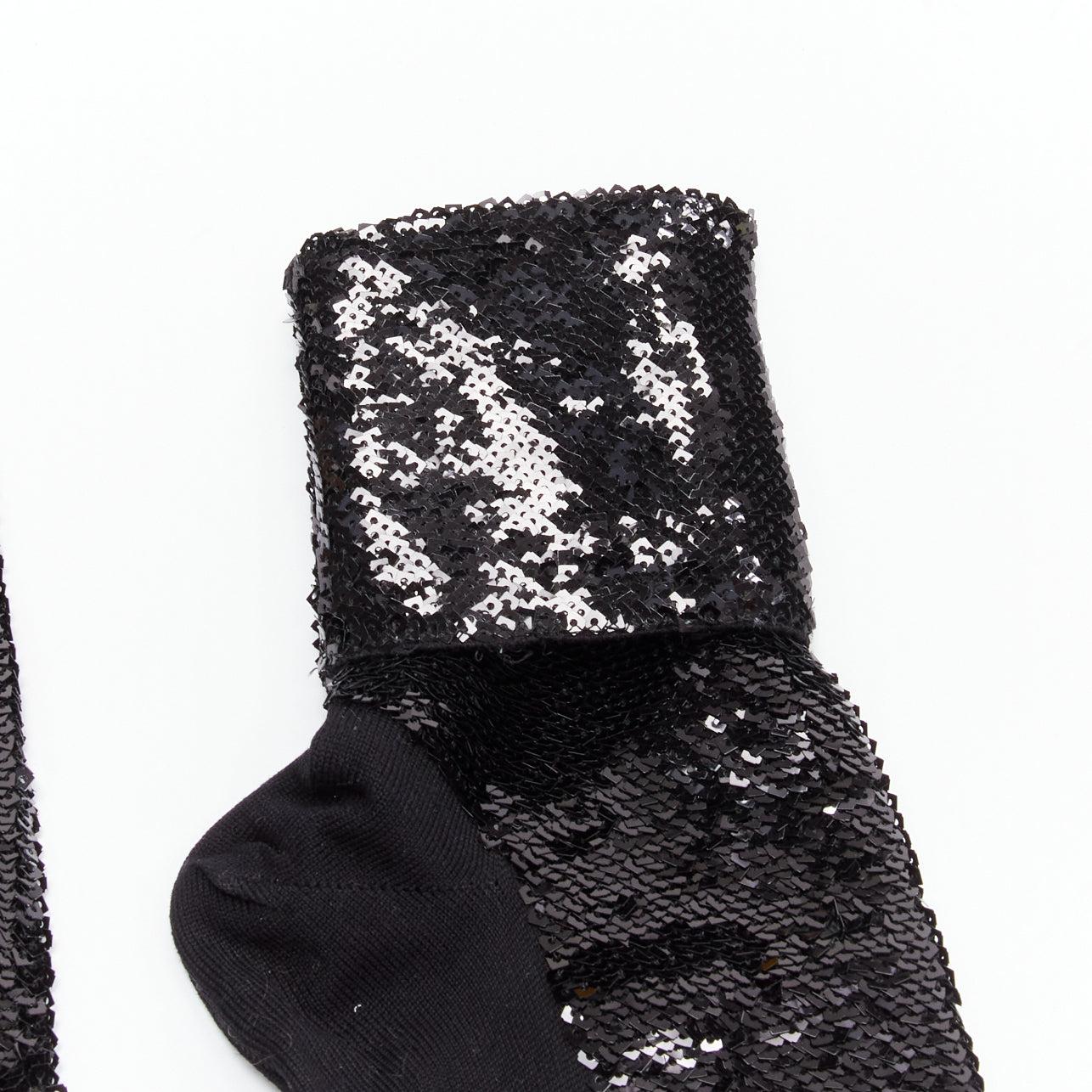 SAINT LAURENT 2016 black sequins cotton blend rolled cuffed socks EUR38
Reference: BSHW/A00129
Brand: Saint Laurent
Designer: Anthony Vaccarello
Collection: 2016
Material: Cotton, Blend
Color: Black
Pattern: Solid
Closure: Pullover
Lining: Black