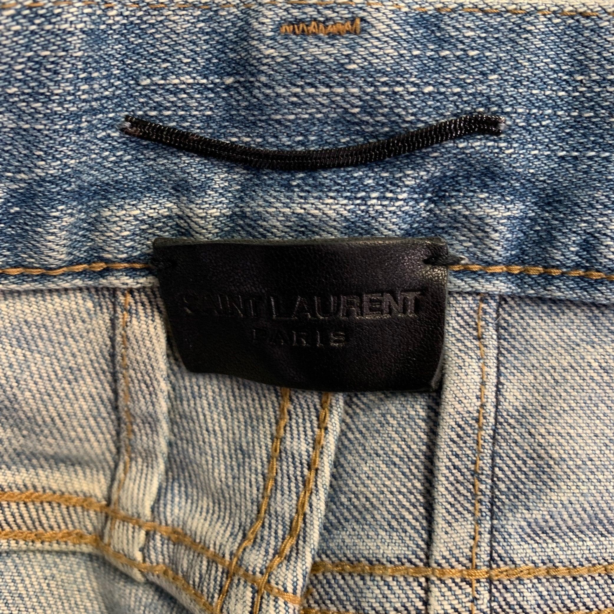 SAINT LAURENT 2016 Size 31 Blue Distressed Cotton Blend Narrow Leg Jeans In Excellent Condition For Sale In San Francisco, CA