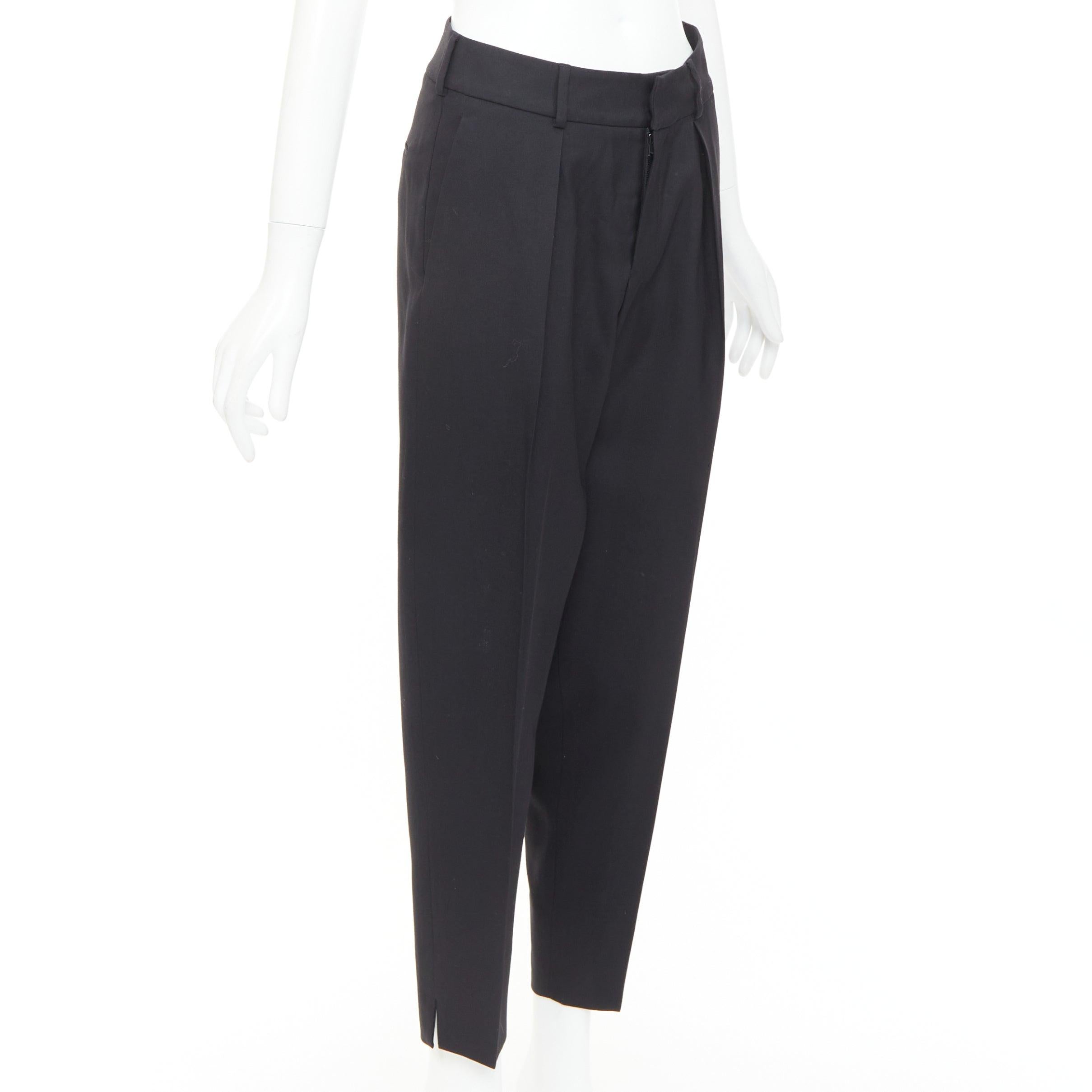 SAINT LAURENT 2017 black wool pleat front tapered silk lined trousers FR36 S
Reference: NKLL/A00610
Brand: Saint Laurent
Designer: Anthony Vaccarello
Collection: 2017
Material: Wool
Color: Black
Pattern: Solid
Closure: Zip Fly
Lining: Black