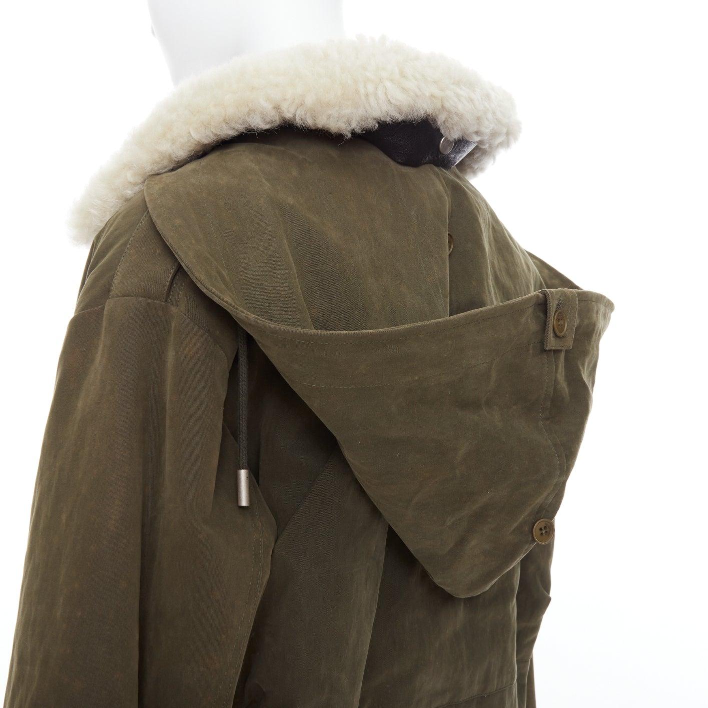 SAINT LAURENT 2017 cream full shearling lined green cotton utility parka coat FR40 L
Reference: CNLE/A00306
Brand: Saint Laurent
Designer: Anthony Vaccarello
Collection: 2017
Material: Cotton, Blend
Color: Green, Cream
Pattern: Solid
Closure: