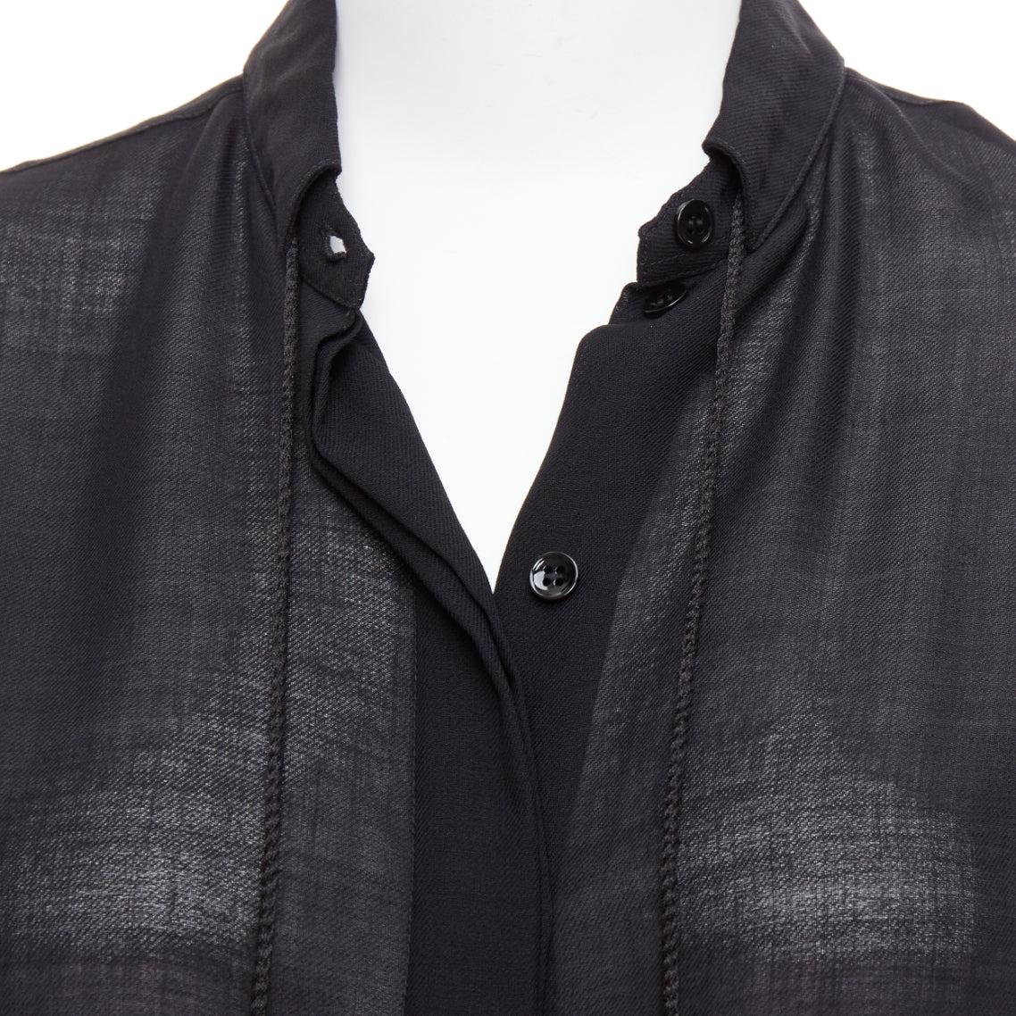 SAINT LAURENT 2018 black semi sheer wool blend YSL rope blouse FR34 XS
Reference: GEGG/A00141
Brand: Saint Laurent
Designer: Anthony Vaccarello
Collection: 2018
Material: Wool, Blend
Color: Black
Pattern: Solid
Closure: Button
Extra Details: YSL