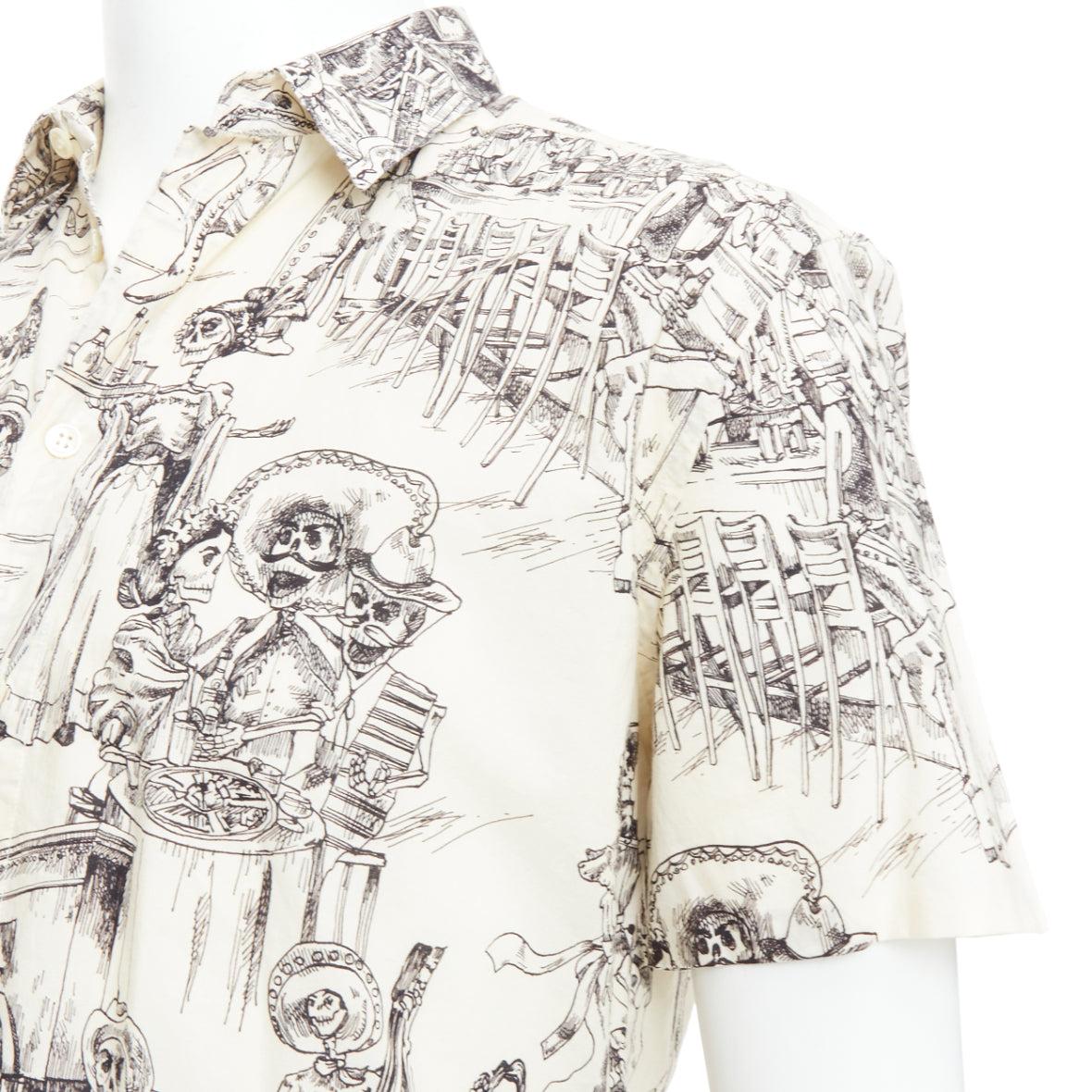 SAINT LAURENT 2018 cream skeleton western party print hawaiian shirt FR38 XS
Reference: JACG/A00210
Brand: Saint Laurent
Designer: Anthony Vaccarello
Collection: 2018
Material: Cotton
Color: Cream, Black
Pattern: Ethnic
Closure: Button
Extra