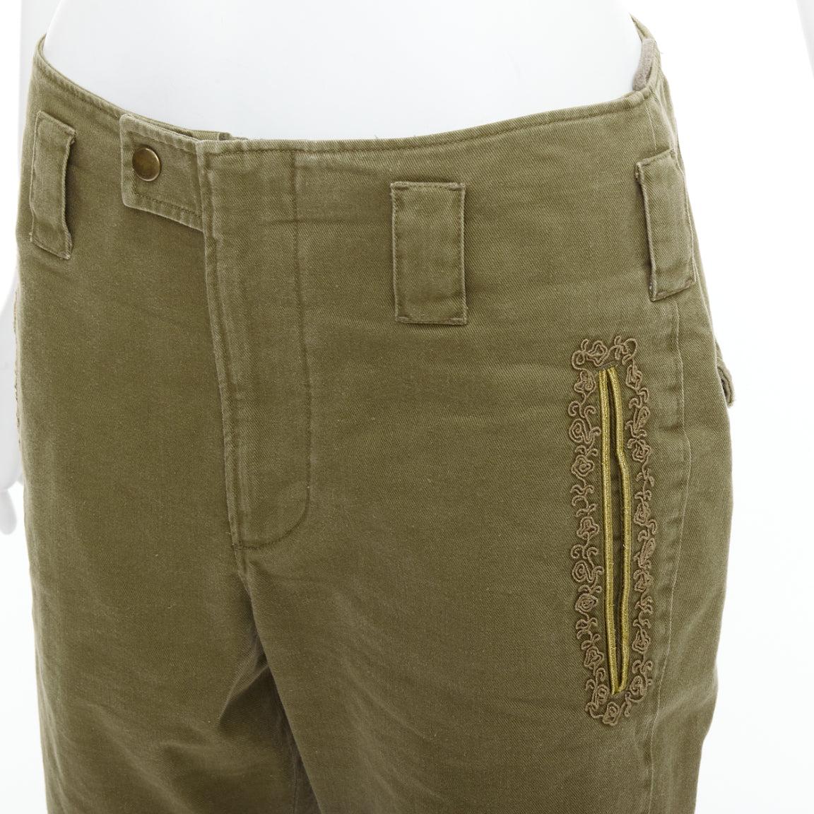 SAINT LAURENT 2018 green gold cotton ramie embroidered military shorts FR36 S
Reference: NKLL/A00395
Brand: Saint Laurent
Designer: Anthony Vaccarello
Collection: 2018
Material: Cotton, Ramie
Color: Green, Gold
Pattern: Solid
Closure: Zip Fly
Extra