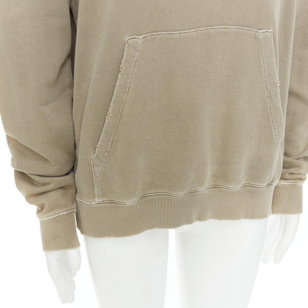 SAINT LAURENT 2018 stone cotton distressed washed logo hoodie S
Reference: CNLE/A00418
Brand: Saint Laurent
Designer: Anthony Vaccarello
Collection: 2018
Material: Cotton
Color: Stone
Pattern: Solid
Closure: Pullover
Made in: