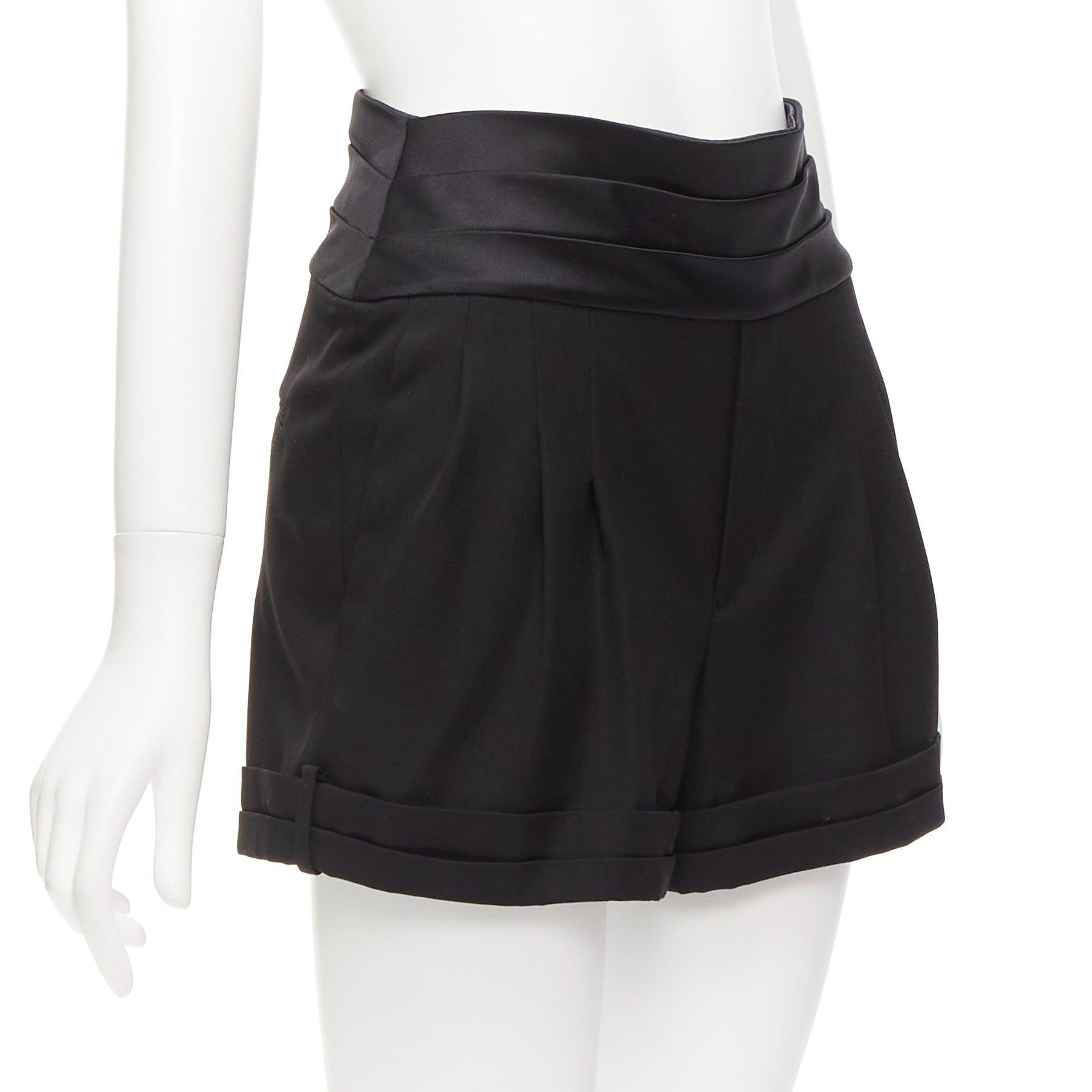 SAINT LAURENT 2019 black virgin wool cumberband high waist shorts FR36 S
Reference: AAWC/A00853
Brand: Saint Laurent
Designer: Anthony Vaccarello
Collection: 2019
Material: Virgin Wool
Color: Black
Pattern: Solid
Closure: Zip
Lining: Black