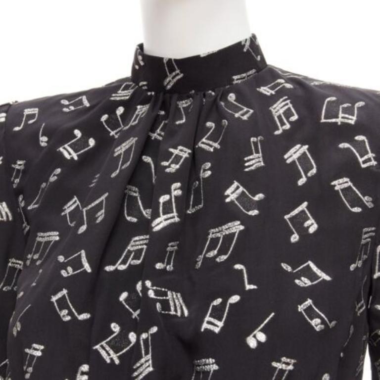 SAINT LAURENT 2019 Musical Note silver embroidered puff sleeve mini dress FR34
Reference: AAWC/A00681
Brand: Saint Laurent
Designer: Anthony Vaccarello
Collection: 2019
Material: Silk, Polyester
Color: Black, Silver
Pattern: Other
Closure: