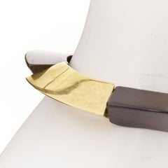 SAINT LAURENT 2020 Pulsera tipo peonza en latón dorado, madera y elástico