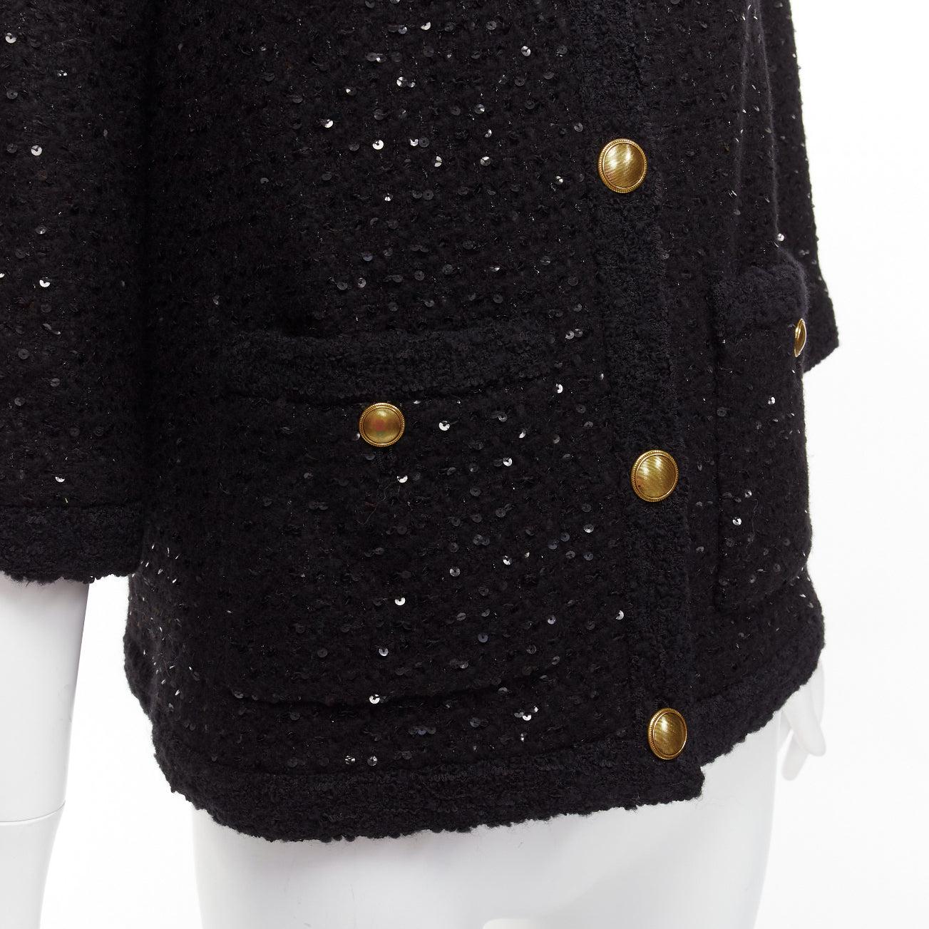 SAINT LAURENT 2021 black wool sequinned tweed gold button jacket FR34 XS
Reference: AAWC/A00717
Brand: Saint Laurent
Designer: Anthony Vaccarello
Collection: 2021
Material: Wool, Blend
Color: Black, Gold
Pattern: Sequins
Closure: Button
Lining:
