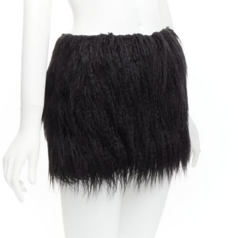 SAINT LAURENT 2021 Runway black faux fur mini skirt FR34 XS
Reference: TGAS/D00741
Brand: Saint Laurent
Designer: Anthony Vaccarello
Collection: 2021 - Runway
Material: Faux Fur
Color: Black
Pattern: Solid
Closure: Snap Buttons
Lining: Black