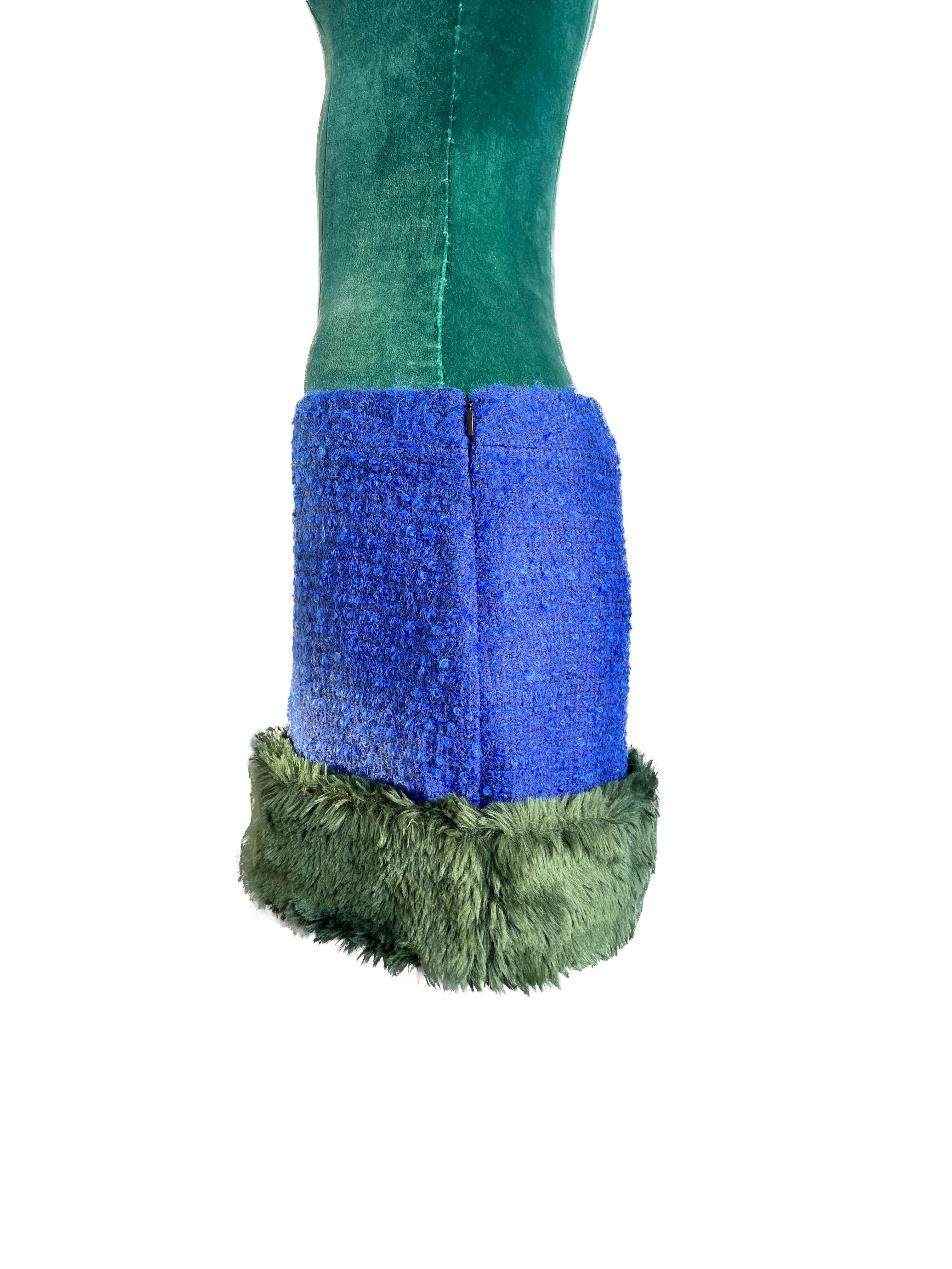 Saint Laurent's 2021 runway collection showcased a daring fusion of edgy street style and luxurious materials, and one standout piece that epitomized this bold aesthetic was the blue tweed mini skirt with vibrant green faux fur trim. This