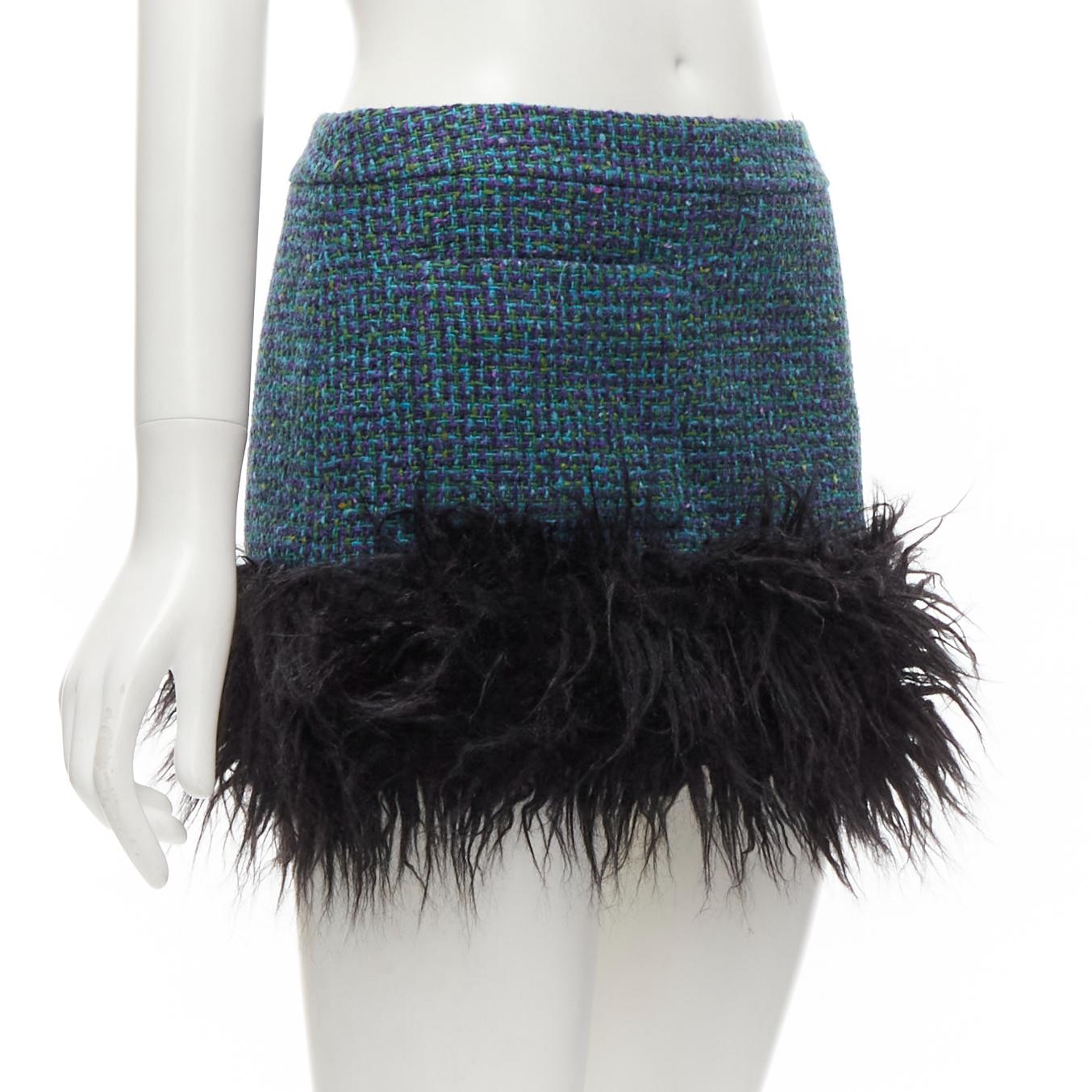 SAINT LAURENT 2022 blue tweed faux fur trim mini skirt FR38 M
Reference: TGAS/E00181
Brand: Saint Laurent
Designer: Anthony Vaccarello
Collection: 2021 - Runway
Material: Tweed
Color: Blue, Black
Pattern: Solid
Closure: Zip
Lining:  Fully