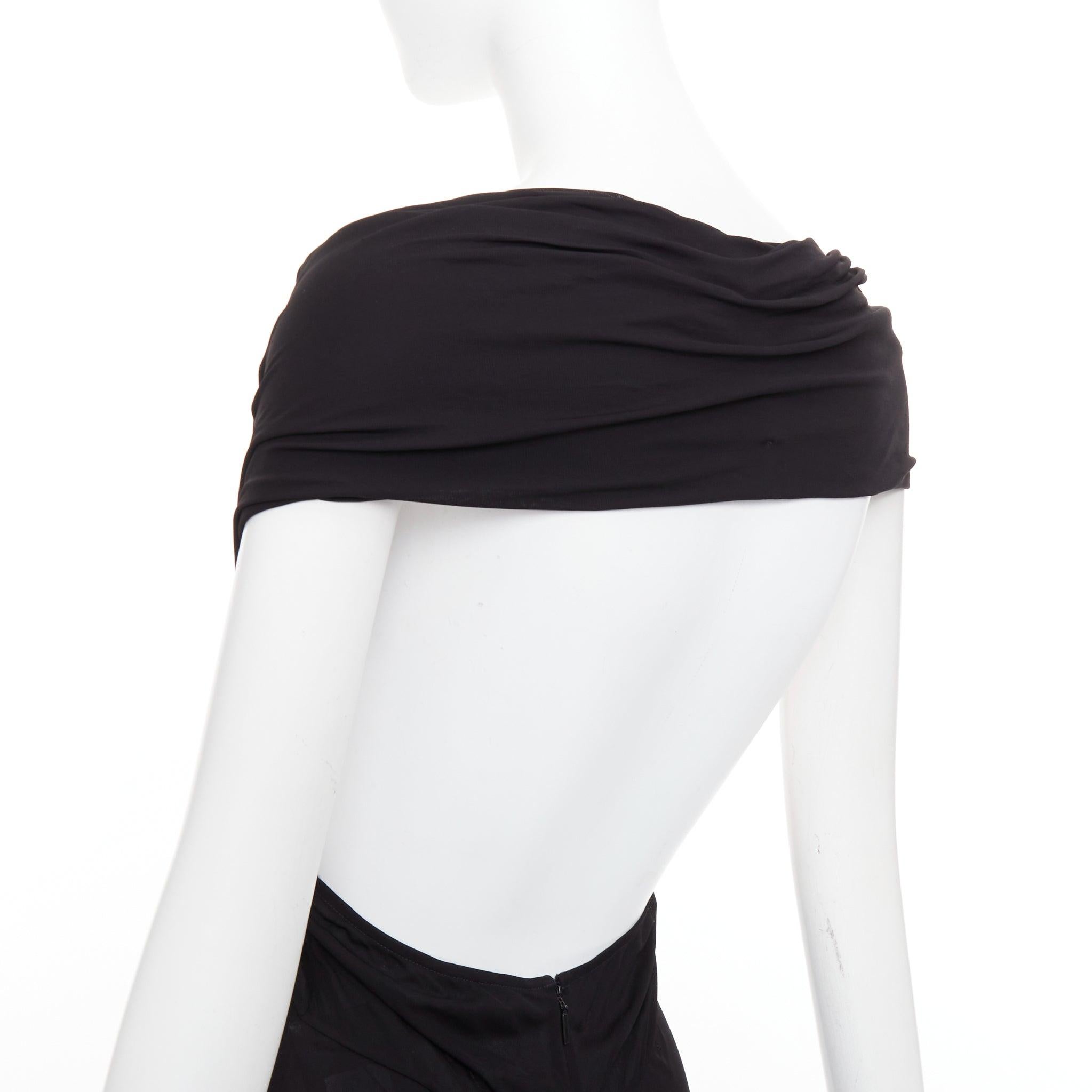 SAINT LAURENT 2022 noir robe midi à dos ouvert, épaules froncées et découpes FR38 S
Référence : TGAS/F00521
Marque : Saint Laurent
Designer : Anthony Vaccarello
Collection : Automne-Hiver 2022
Matériau : Viscose
Couleur : Noir
Motif :