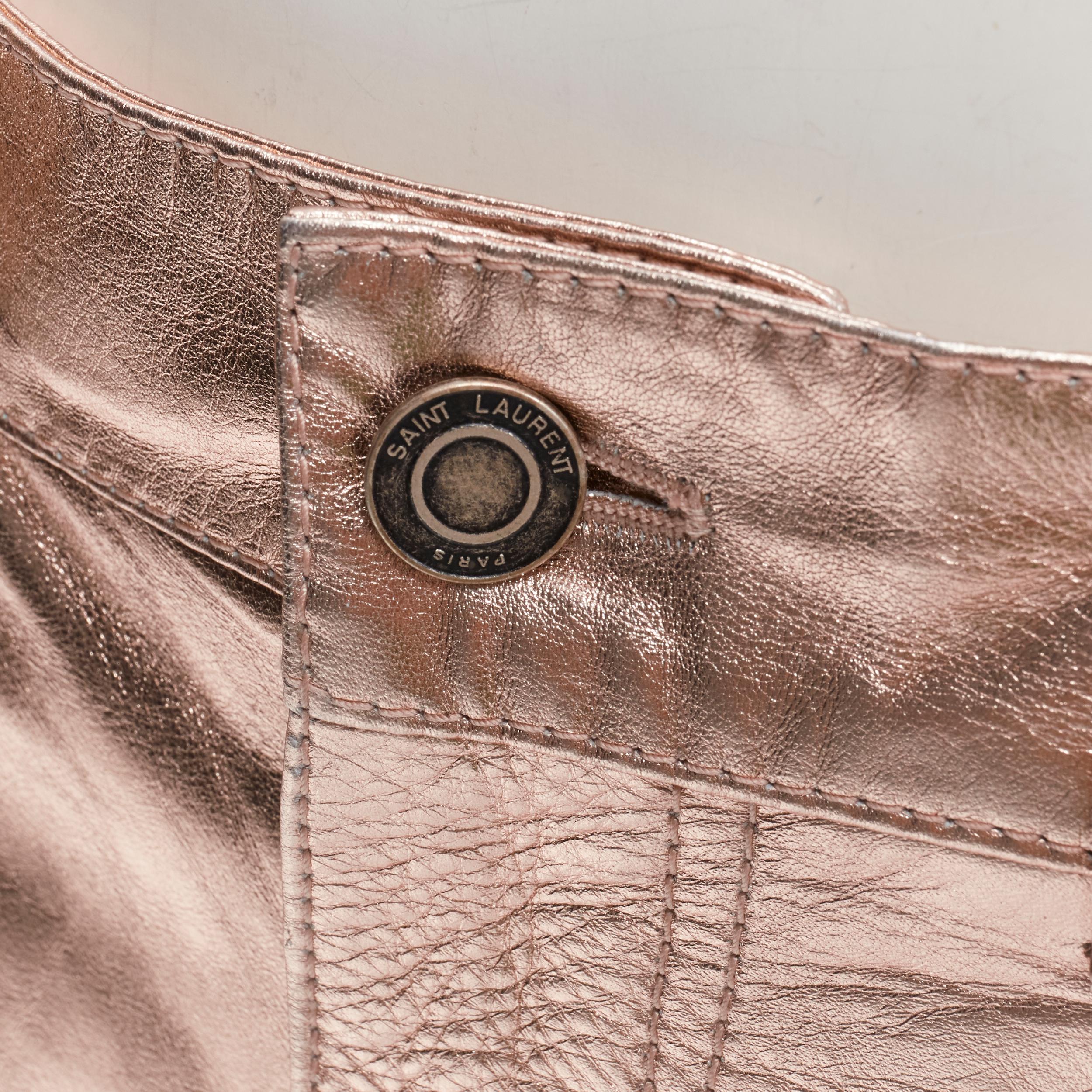 SAINT LAURENT 2022 metallic copper genuine leather mini skirt FR36 S
Brand: Saint Laurent
Designer: Anthony Vaccarello
Material: Leather
Color: Bronze
Pattern: Solid
Closure: Zip Fly
Extra Detail: 5-pocket design Antique silver tone hardware. Mini