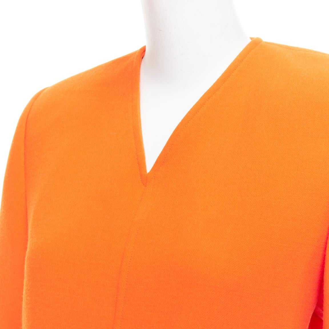 SAINT LAURENT 2022 Runway orange wool grain de poudre power shoulder mini dress For Sale 3
