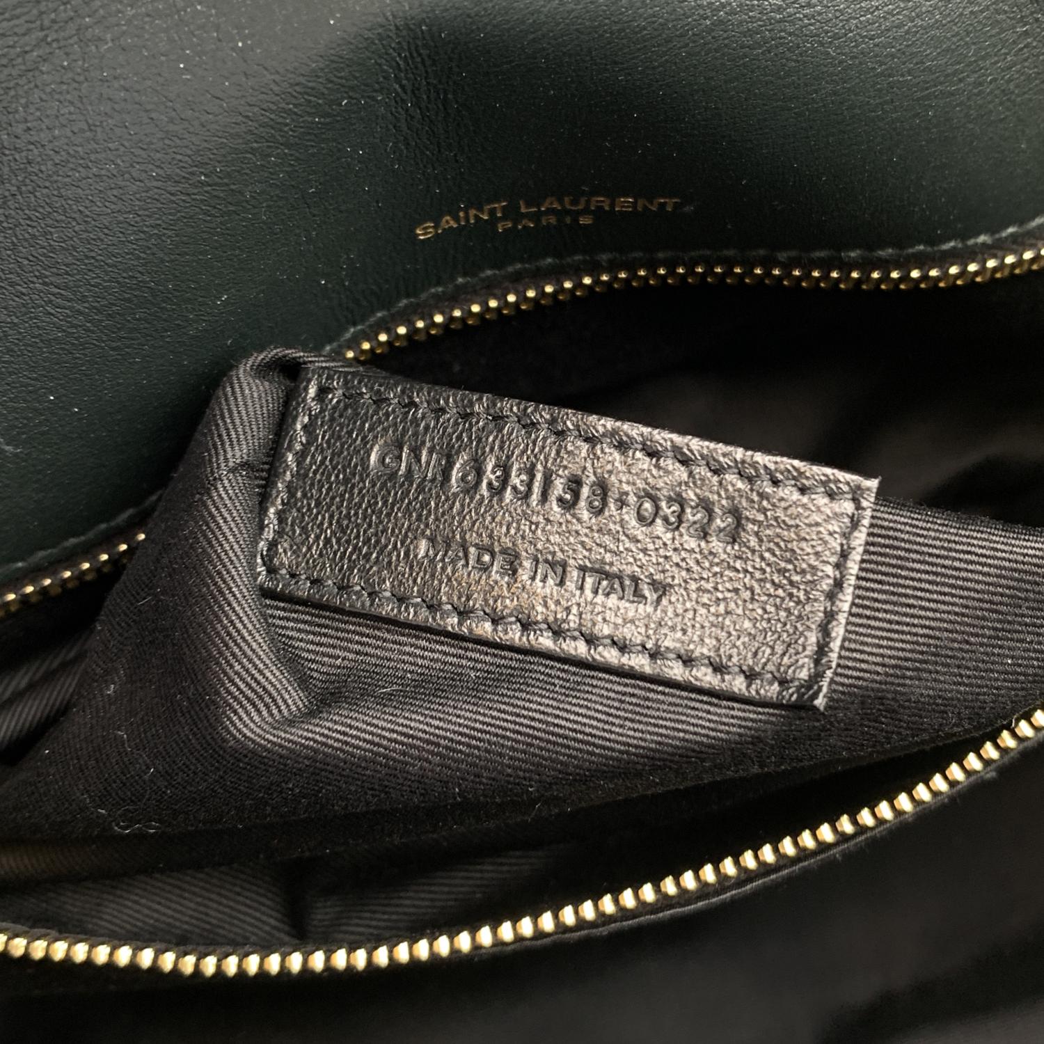 This beautiful Bag will come with a Certificate of Authenticity provided by Entrupy. The certificate will be provided at no further cost.

Iconic SAINT LAURENT 'Niki' in algae green quilted suede. The bag features a front flap with magnetic button