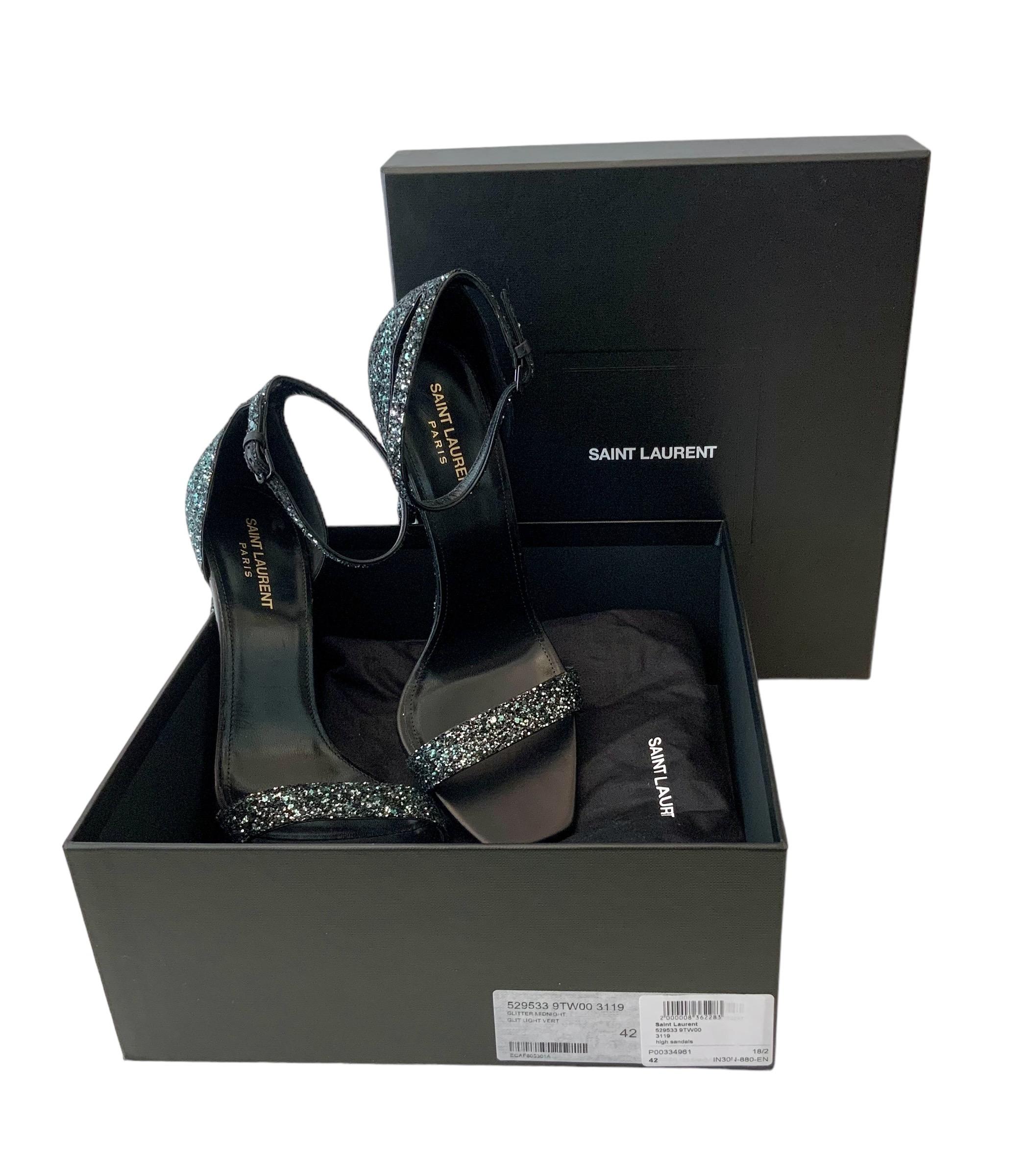 Amazing sandals now a classic from the house of Saint Laurent.
These pre-owned ones are as new as the owner wore them for 1 hour !!!!
They are crafted of black leather and green / blue glitter.
They feature an open toe, sleek ankle strap with a side