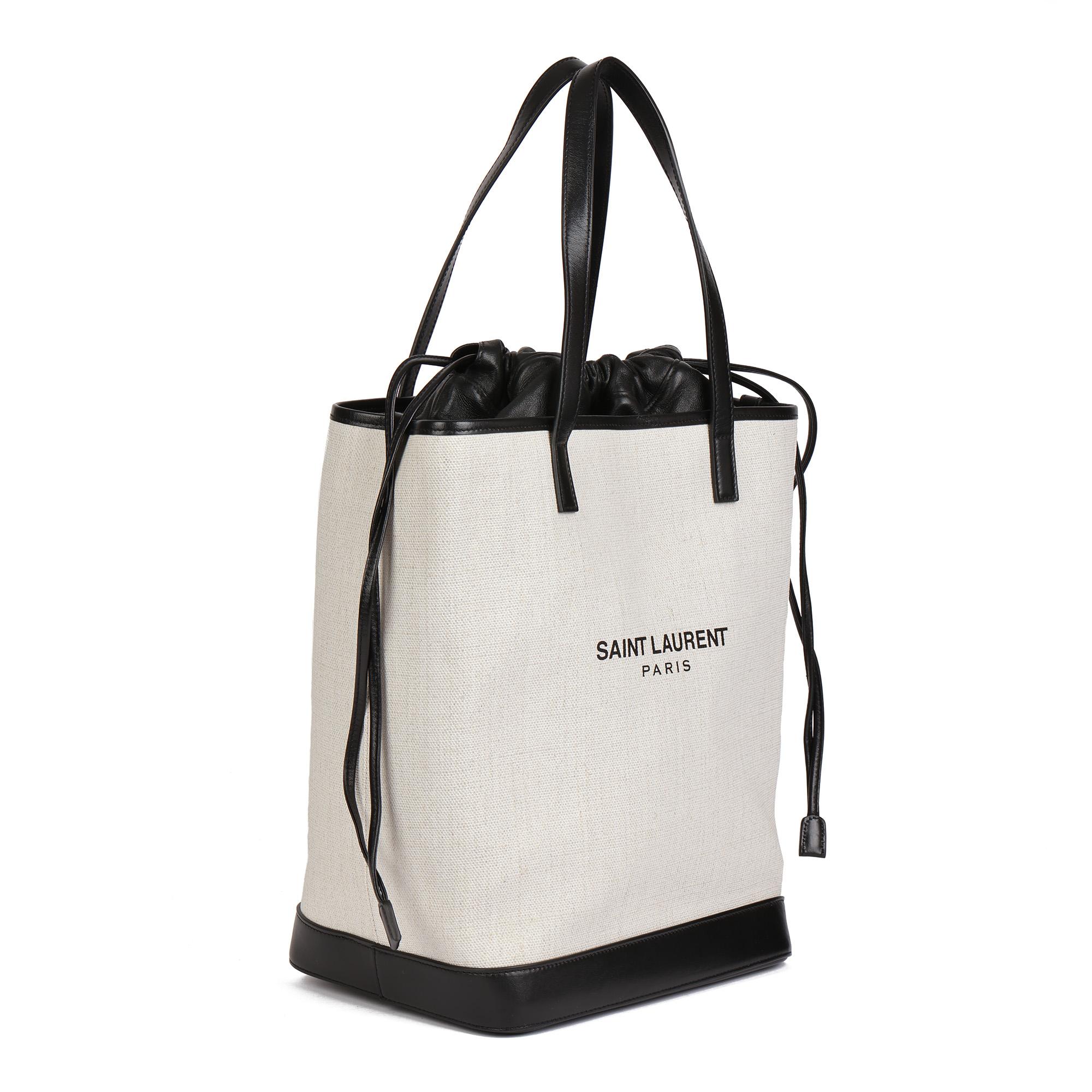SAINT LAURENT
Beige Canvas & Black Calfskin Leather Convertible Teddy Tote

Xupes Reference: HB4712
Serial Number: GAB - 551595 - 1018
Age (Circa): 2018
Accompanied By: Saint Laurent Dust Bag, Care Booklet, Interior Leather Bag, Interior Suede