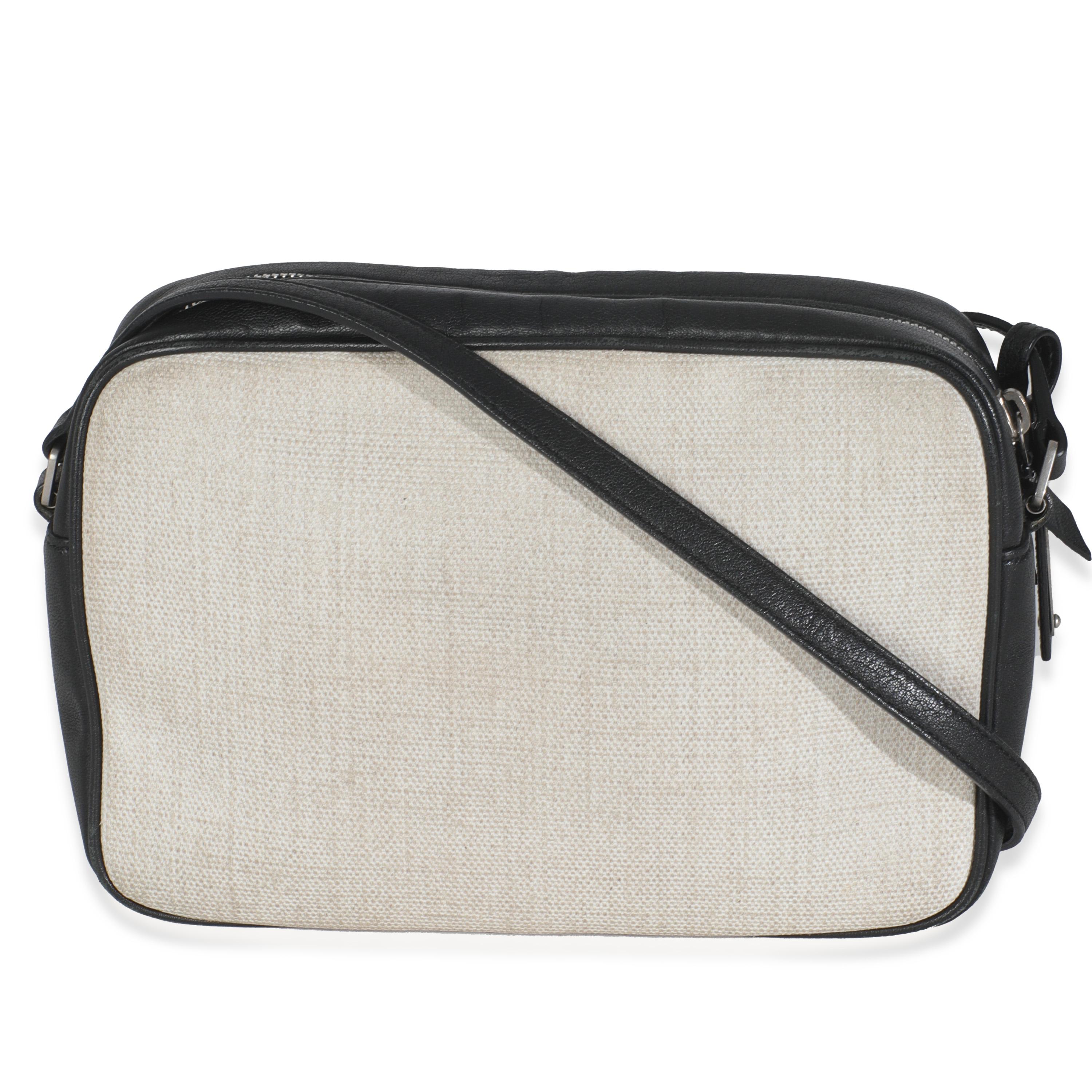 Listing Title: Saint Laurent Beige Linen Canvas Black Lou Camera Bag
SKU: T146430
Condition: Pre-owned 
Condition Description: Named after Loulou de la Falaise, the Loulou bag from Saint Laurent is an ode to one of the founder's greatest muses. The