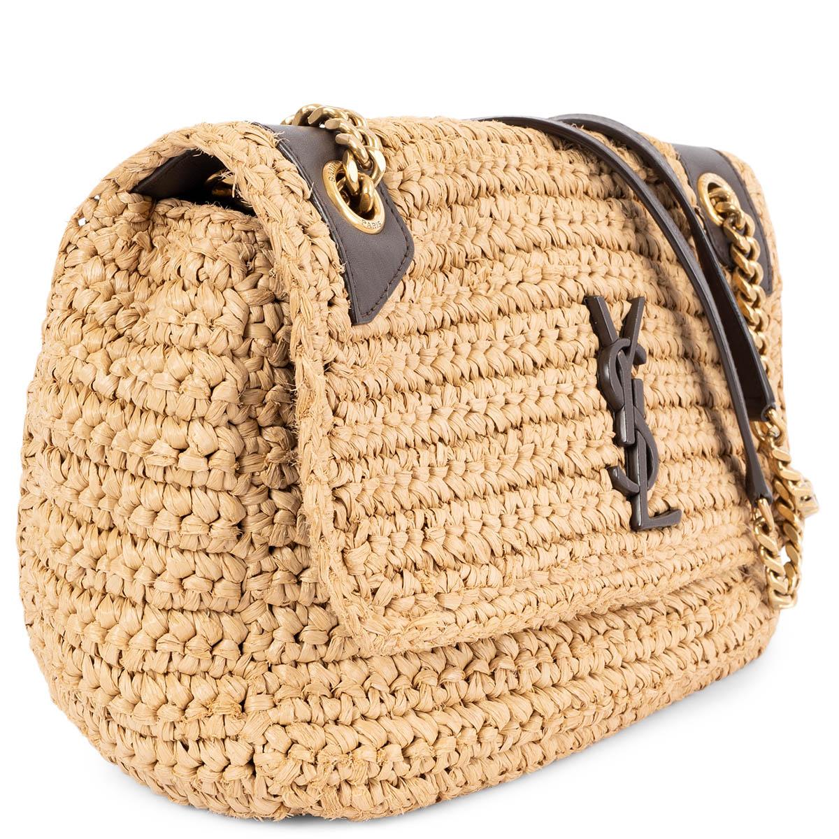100% authentic Saint Laurent Medium Niki shoulder bag in beige woven raffia with espresso brown leather trim and YSL logo on the flap. Opens with a magnetic button under the flap to a black grosgrain lined interior with one zipper pocket against the