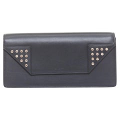 SAINT LAURENT Betty black smooth leather silver studded envelope clutch bag