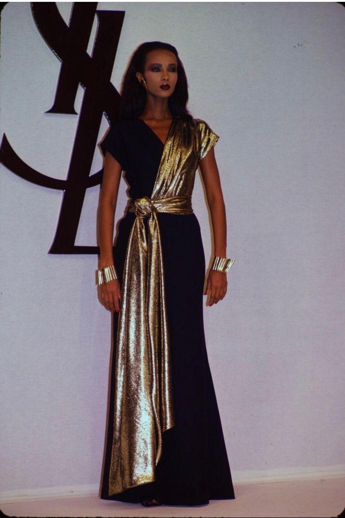 Filled with glitz, glamour, and gold, the 1980s was an era of vivacity and energy, and as usual, Yves Saint Laurent was able to capture the moment and channel it into effortlessly elegant garments. From his Fall/Winter 1986 collection this two-toned