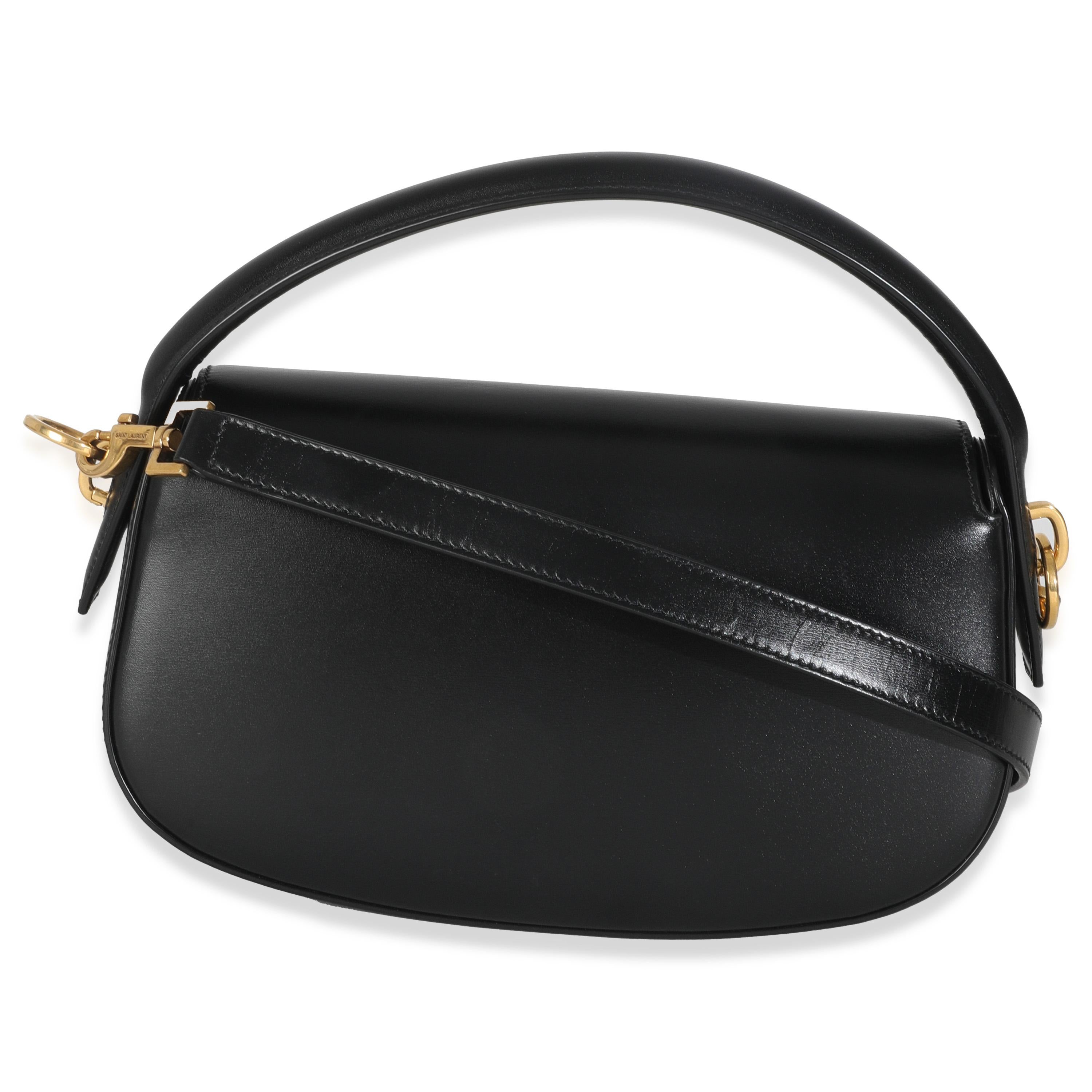 Titolo dell'elenco: Saint Laurent Borsa a manico alto in pelle di vitello nera Voltaire
SKU: 147213
Condizioni: Usato 
Condizioni della borsa: Eccellente
Commenti sulle condizioni: L'articolo è in ottime condizioni e presenta leggeri segni di usura.