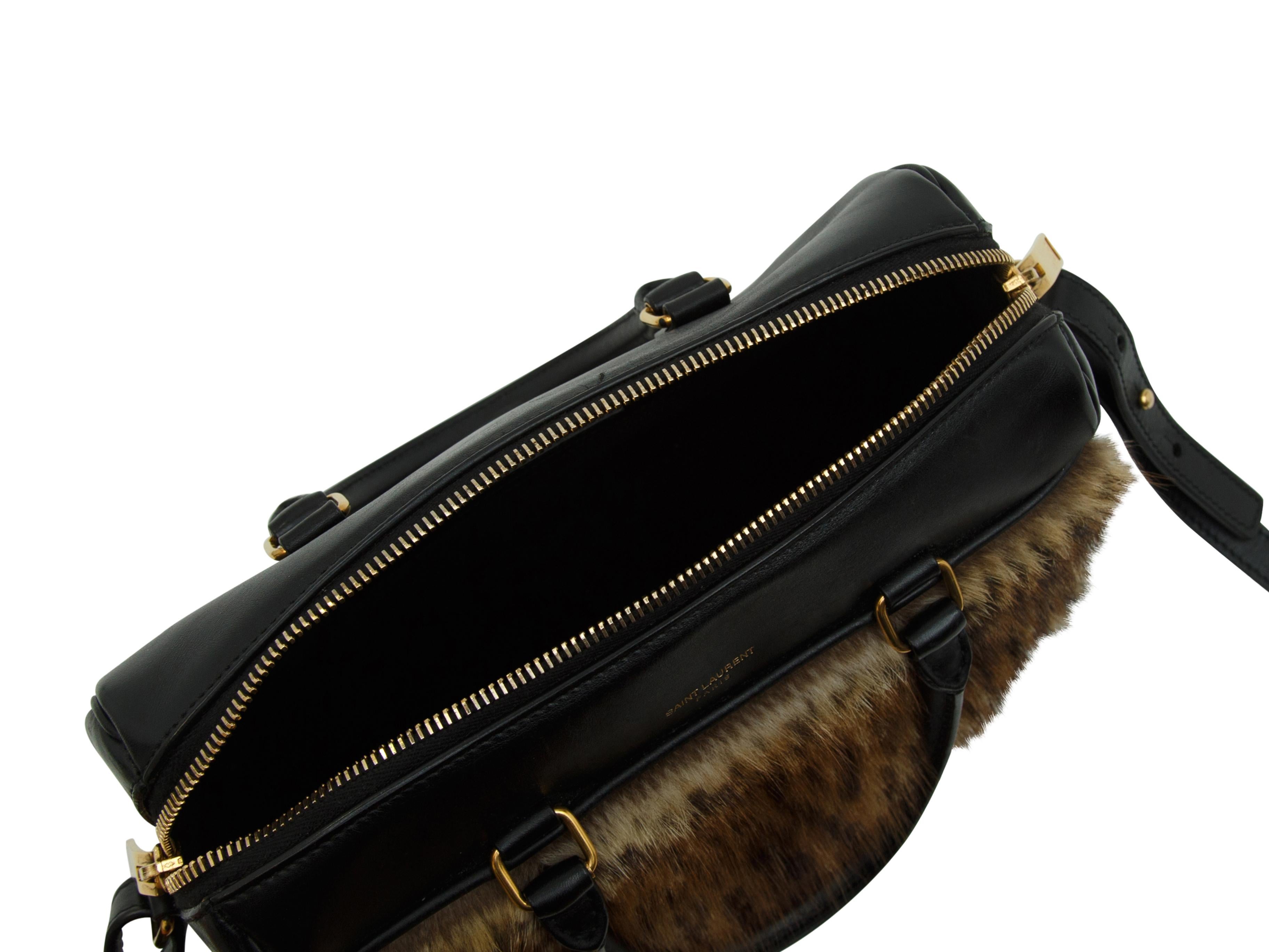 Product details:  Black leather and brown printed marmont fur satchel by Saint Laurent.  Dual top carry handles.  Detachable crossbody strap.  Top zip closure.  Lined interior with inner slide pocket.  Goldtone hardware.  Dust bag included.  9