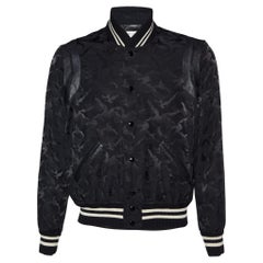 Who designed the Saint Laurent Teddy jacket? - Questions & Answers
