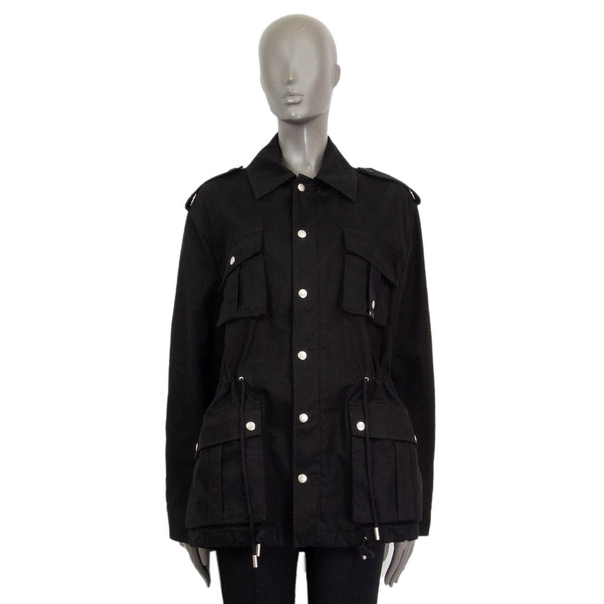 100% authentic Saint Laurent oversized cargo jacket in black cotton (77%) and ramie (23%). Opens with a zipper at front and has four patch pockets and a drawstring at waist. Features silver-tone hardware. Has been worn and is in excellent condition.