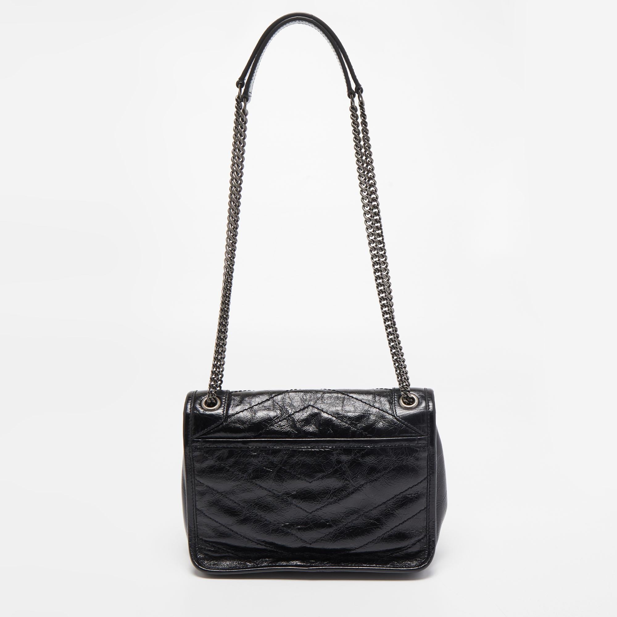 If you are looking for something that reflects chic and luxury, then this Saint Laurent bag is a perfect choice. Crafted from premium materials, it can be conveniently carried around, and its interior is spaciously sized to house your belongings