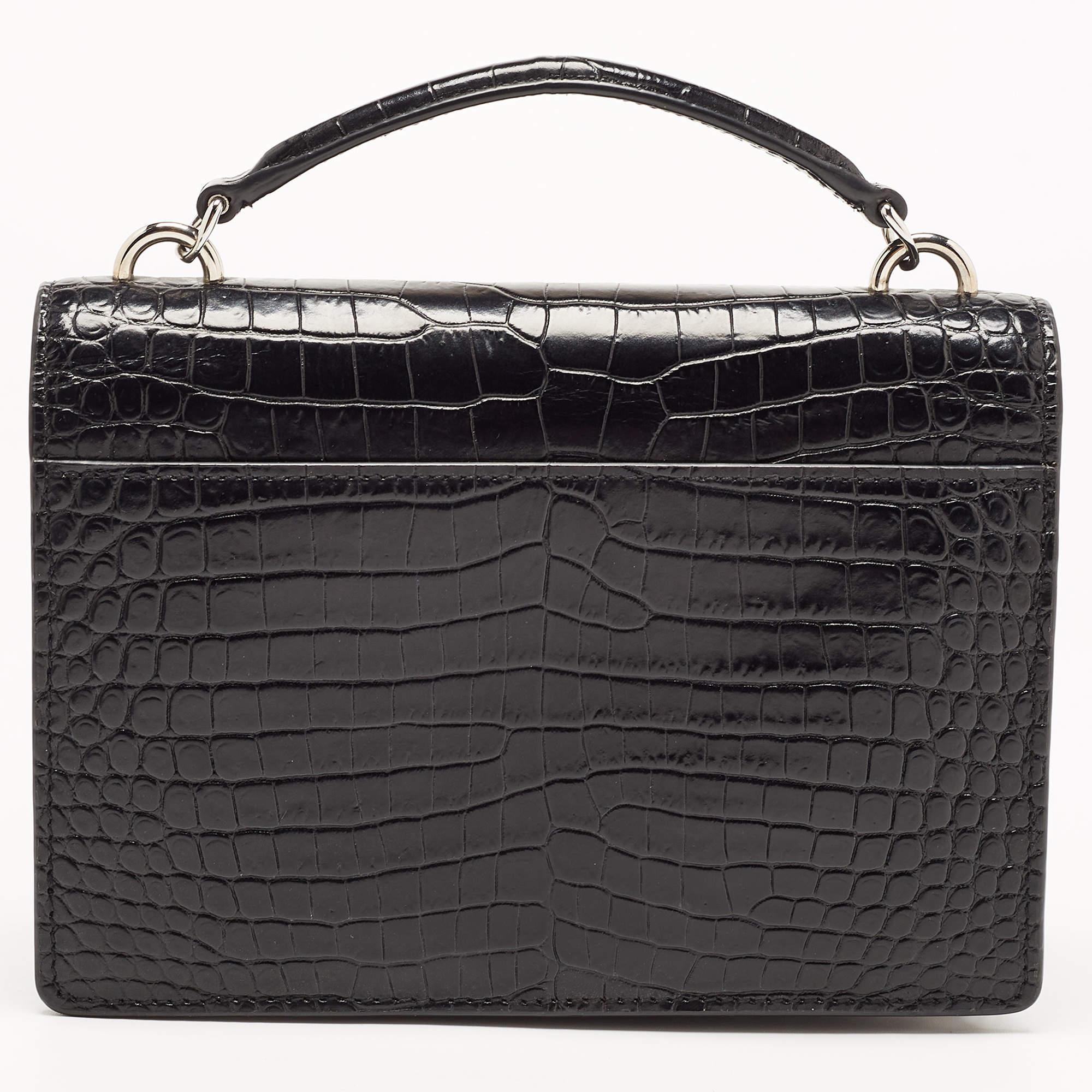 Functional and stylish, this designer label's collections capture the effortless, elegant finesse of the modern woman. Crafted from quality materials, this chic bag is easy to carry and can fit in your daily essentials effortlessly.

