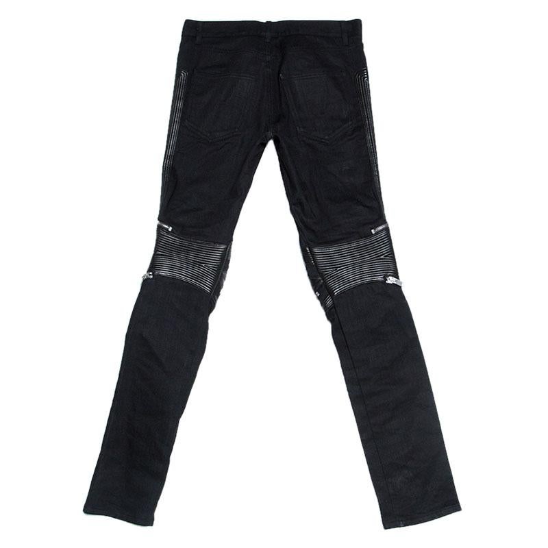 Wear these cool jeans from Saint Laurent every time you go for a casual outing. They are made of black denim, detailed with zippers, leather trims and offer a great fit. The jeans will effortlessly complement your casual, street-wear clothes.

