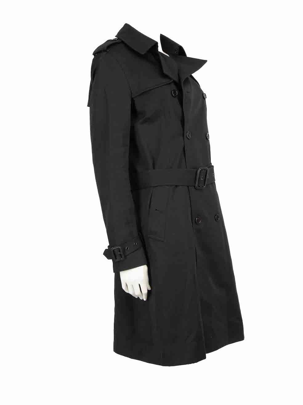 CONDITION is Very good. Hardly any visible wear to coat is evident on this used Saint Laurent designer resale item.
 
 
 
 Details
 
 
 Black
 
 Polyester
 
 Trench coat
 
 Double breasted
 
 Belted
 
 Button up fastening
 
 Buckle cuffs
 
 2x Side