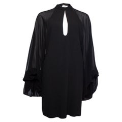 Saint Laurent, black dress with puff sleeves