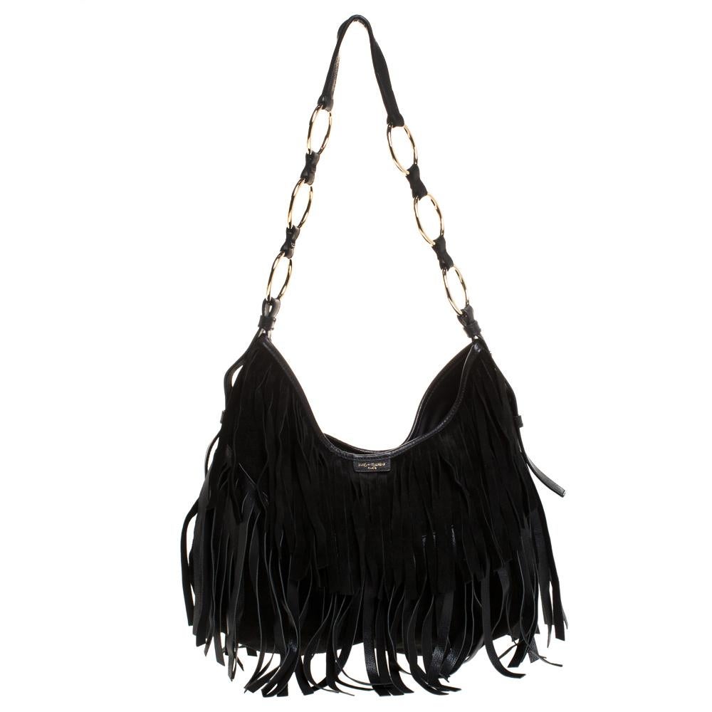 This stylish shoulder bag comes from the house of Saint Laurent. Crafted in Italy, this La Boheme bag is made from quality leather and suede. It comes in black and features a lovely silhouette. It is styled with a single handle with silver-tone