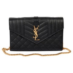 Saint Laurent Portafoglio in pelle trapuntata Cassandre nero Grain de Poudre