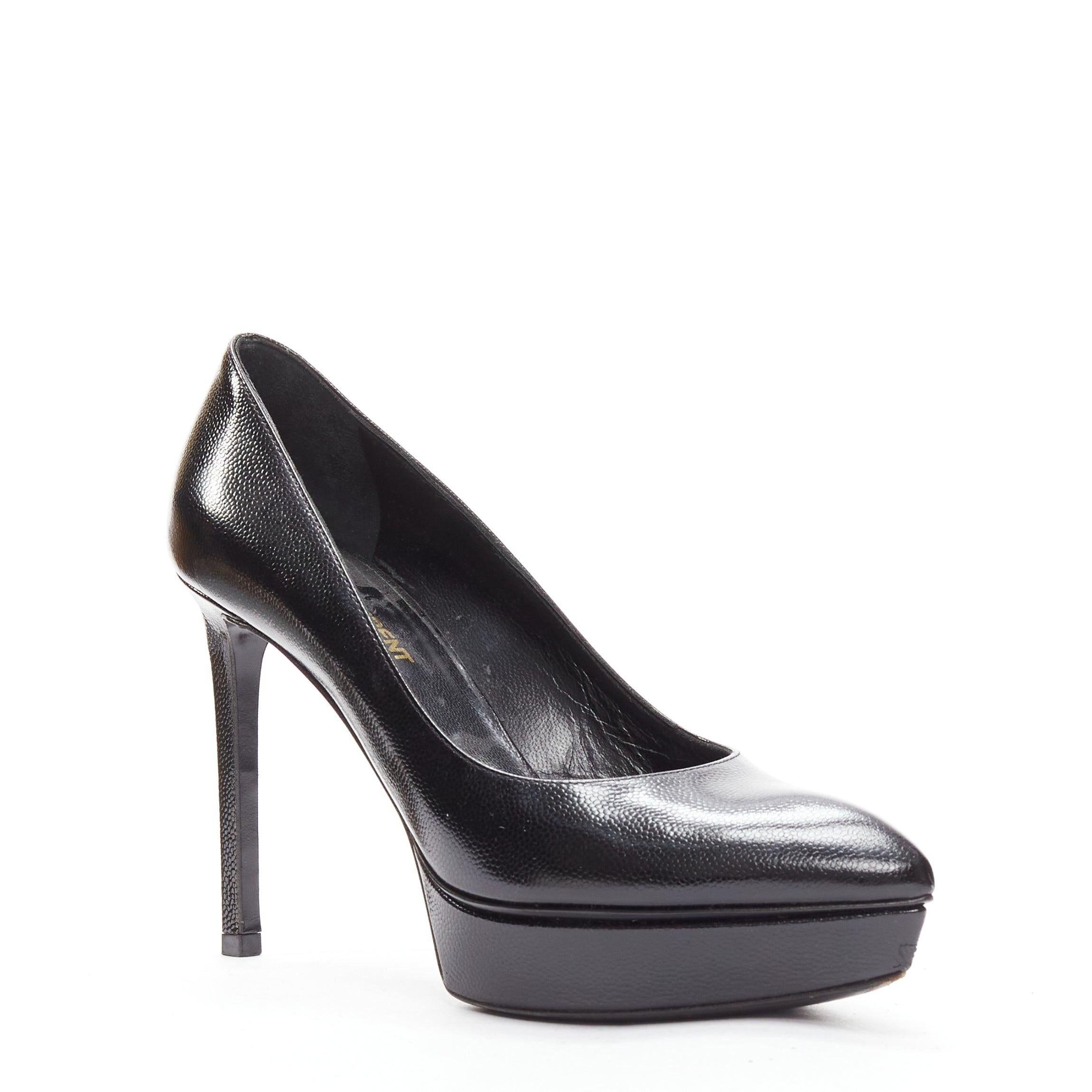 SAINT LAURENT black grained leather point toe platform pumps EU37
Reference: MEKK/A00002
Brand: Saint Laurent
Material: Leather
Color: Black
Pattern: Solid
Closure: Slip On
Lining: Black Leather
Made in: Italy

CONDITION:
Condition: Very good, this