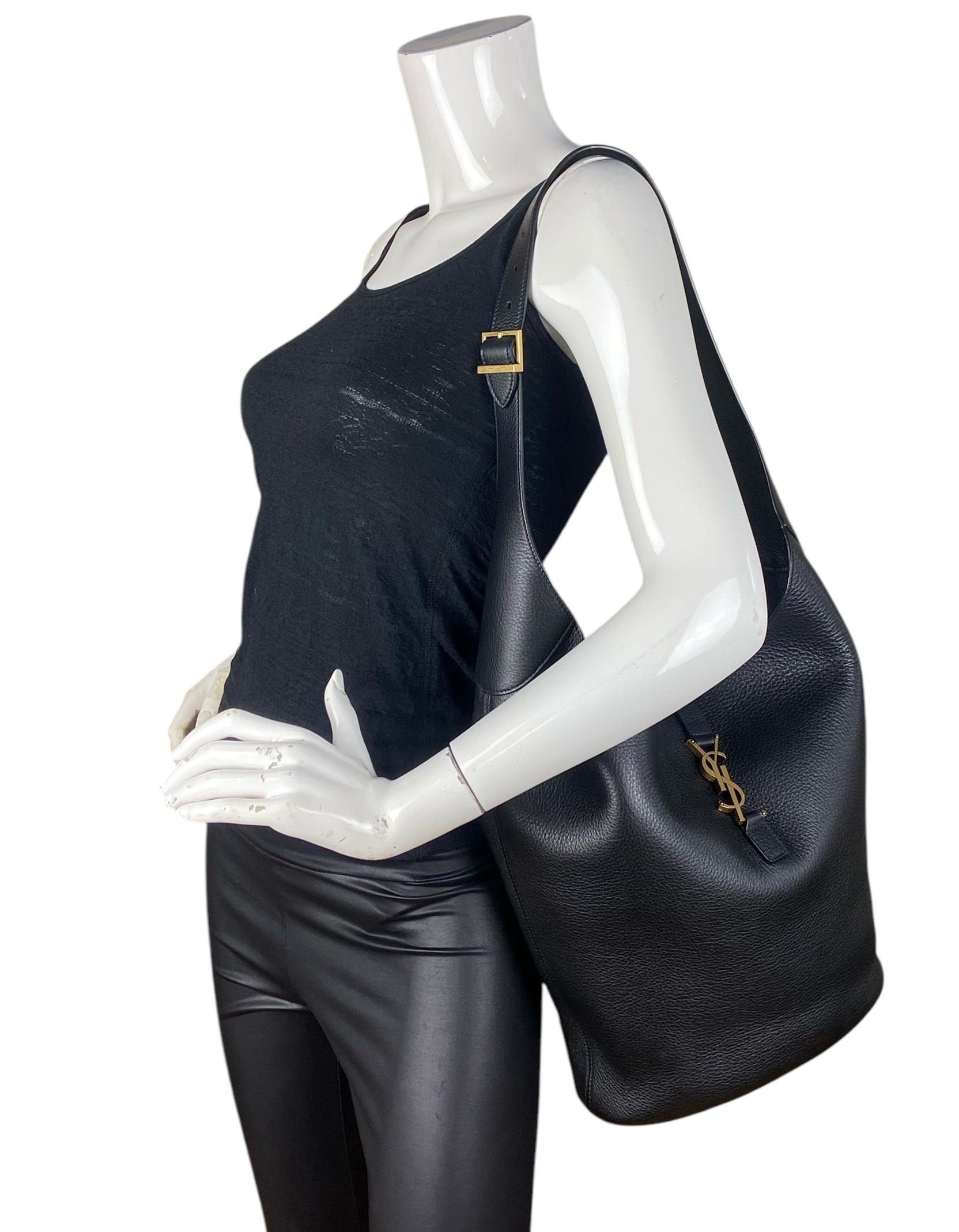 Saint Laurent Black Le 5 à 7 Grained Leather Hobo bag

Made In: Italy
Color: Black
Hardware: Gold
Materials: Calfskin leather, metal
Lining: Black suede 
Closure/Opening: Open with center leather piece
Exterior Pockets: None
Interior Pockets: Inner
