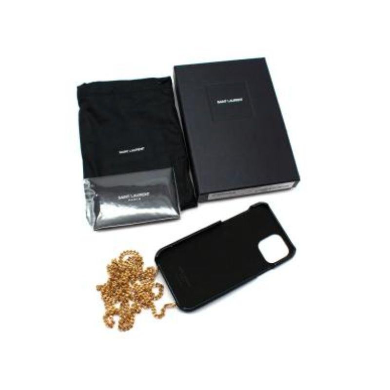 Saint Laurent Black Leather 11 Pro iPhone Crossbody case

-Detachable gold tone strap 
-For Iphone Apple 11 Pro 
-Gold tone engraved logo 
-Black leather body 

Material: 

Leather 

Made in Italy 

PLEASE NOTE, THESE ITEMS ARE PRE-OWNED AND MAY