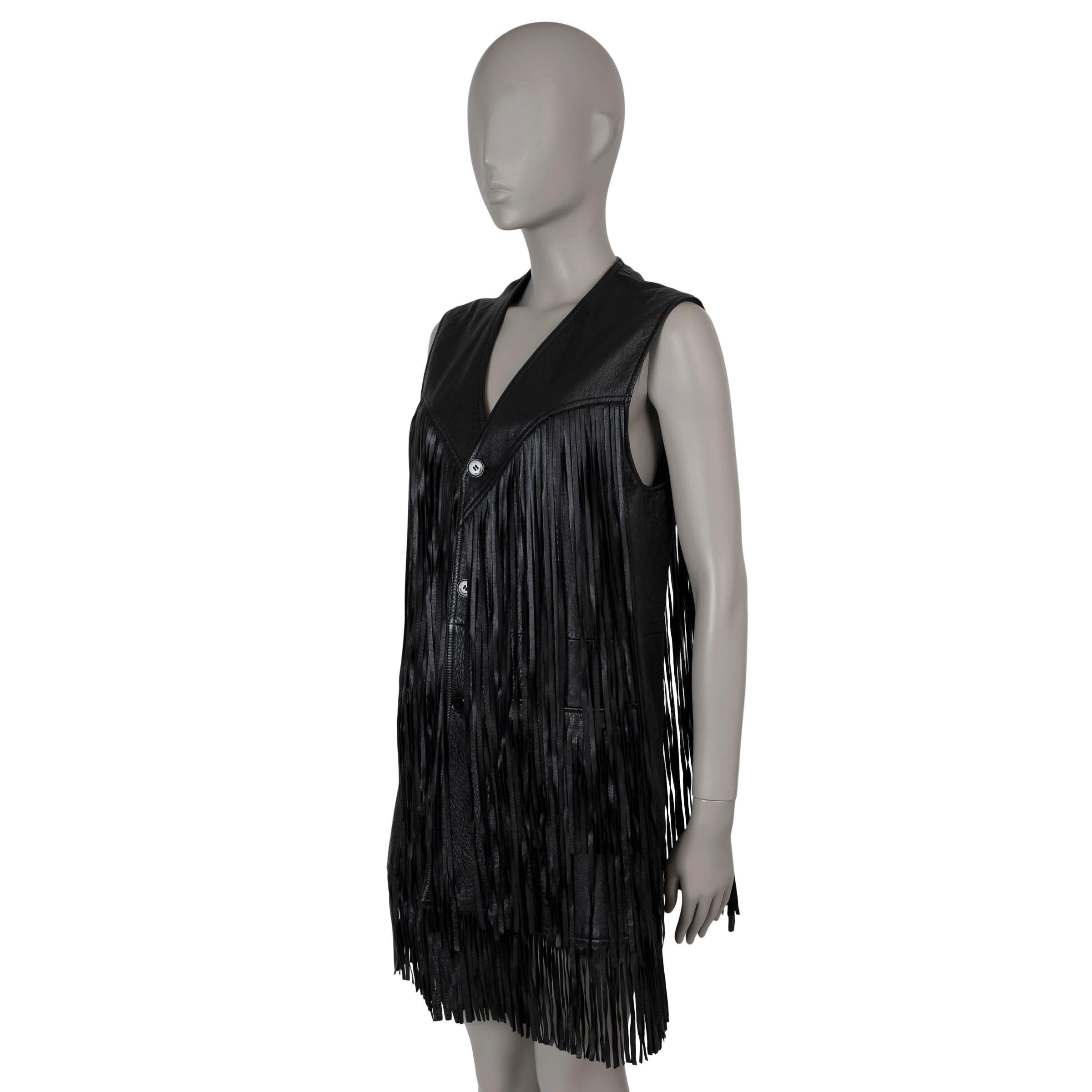This 100% authentic Saint Laurent vest in black leather is a standout piece, featuring a tailored silhouette with long fringe detailing on the front, back, and hem for a bold, bohemian look. It includes two patch pockets adorned with fringe and a