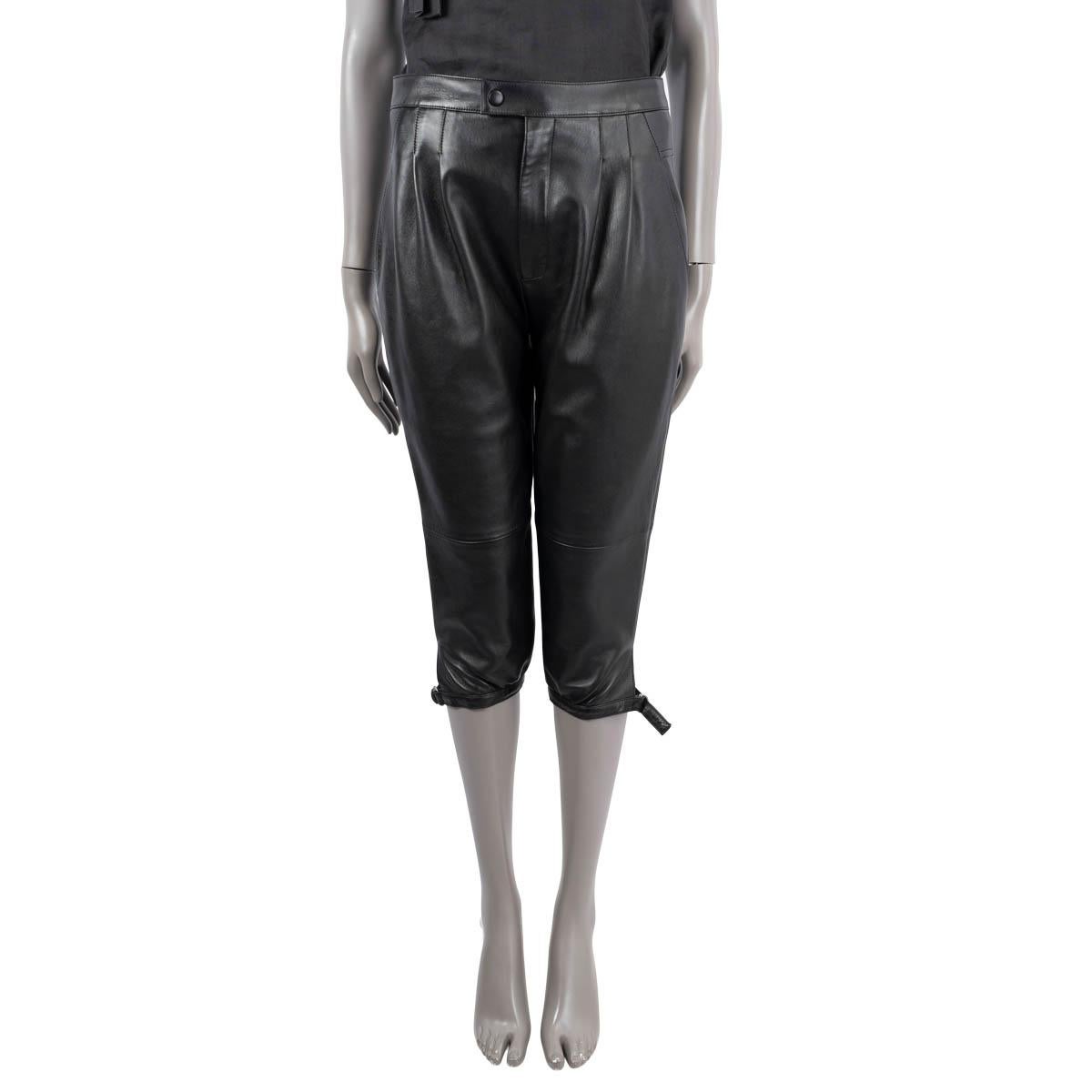 100% authentic Saint Laurent cropped leather pant in black leather (100%) with a high rise. Lined in black cupro (59%) and silk (41%). Features have two slit pockets on the front, and buckle at the ankle. Open closes with a zipper and button one