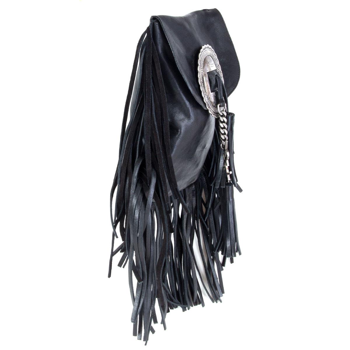 authentic Saint Laurent Anita fringed crossbody bag in black smooth leather featuring silver-tone hardware. Opens with a flap and tassels with chain and YSL logo. Lined in black suede. Has been carried and is in excellent condition. 

Height 23cm