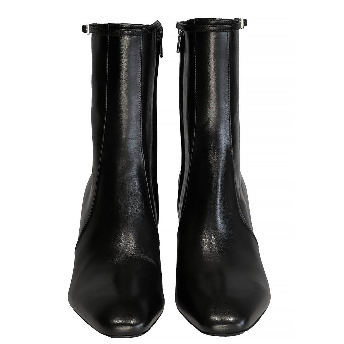 100% authentic Saint Laurent Betty 70 ankle boots black lambskin leather. Feature thin buckled ankle straps, block heel and square pointed toes. Open with a zipper on the side. Brand new. Come with dust bag.

Please Note: These ship from the