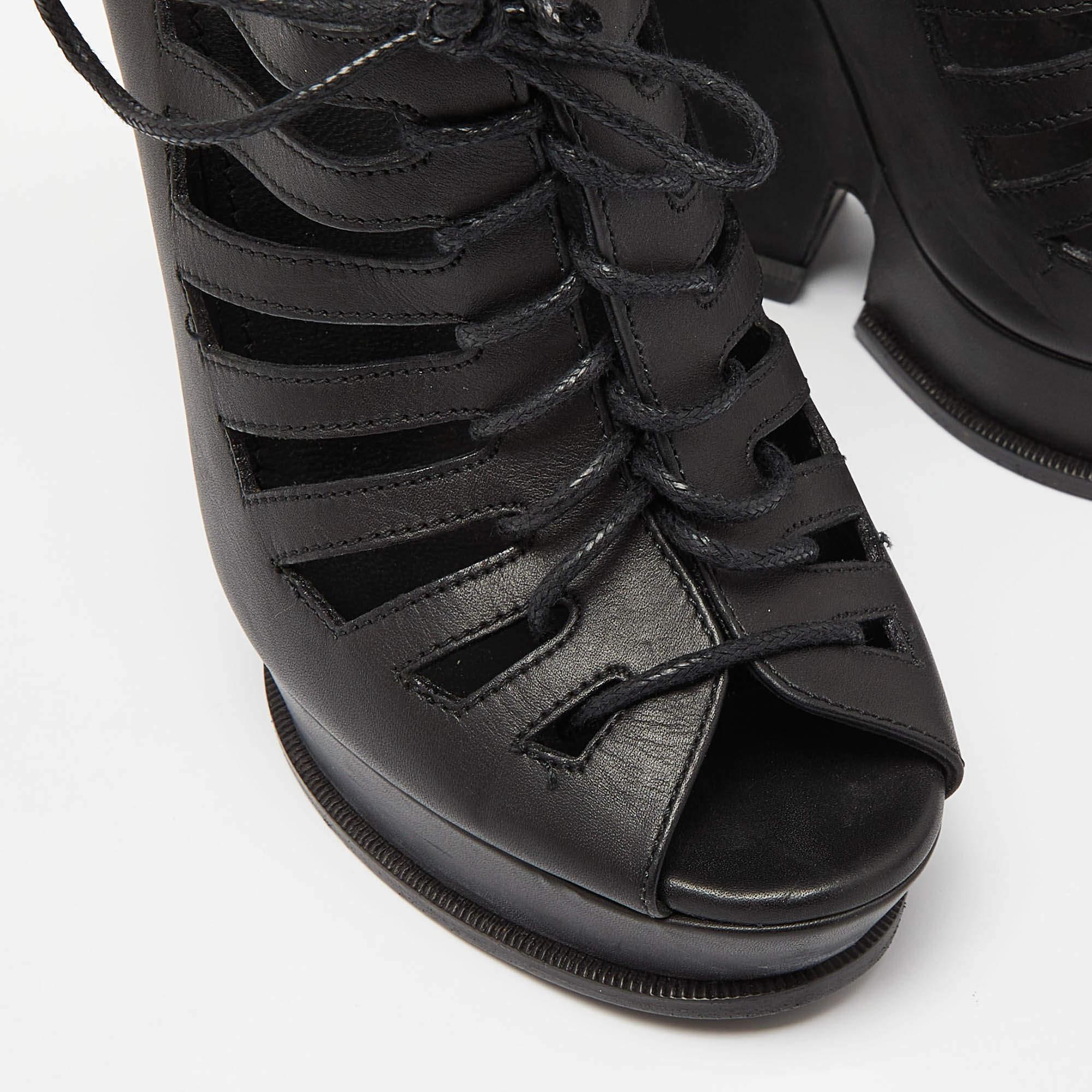 Saint Laurent Botines Hortense de cuña y plataforma en piel negra recortada Talla 38.5 en venta 2