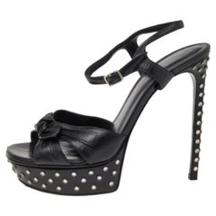 Saint Laurent Schwarze Plateau-Sandalen mit Knöchelriemen aus Leder mit Verzierungen Größe 38