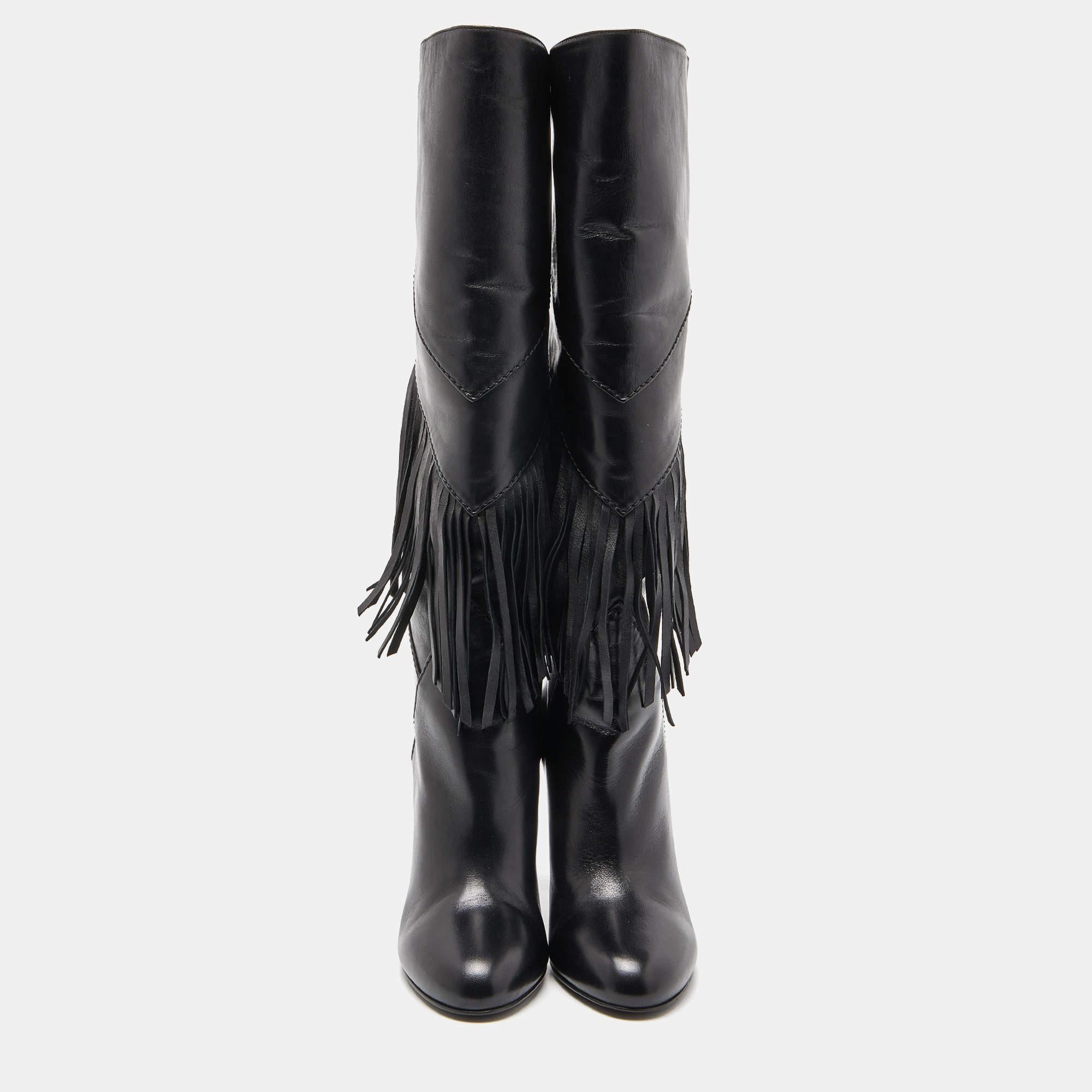 Stylish and perfect for a host of occasions, these Saint Laurent boots are must-haves! They have been crafted from black-hued leather and styled with fringes and 10.5 cm heels.

Includes: Original Box, Original Dustbag, Extra Heel Tips

