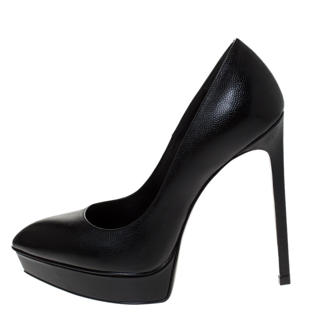 We've fallen head over heels in love with these pumps from Saint Laurent! They are crafted from leather and styled with pointed toes, platforms, and 13 cm heels. Truly high fashion, this pair will effortlessly bring out the fashionista in