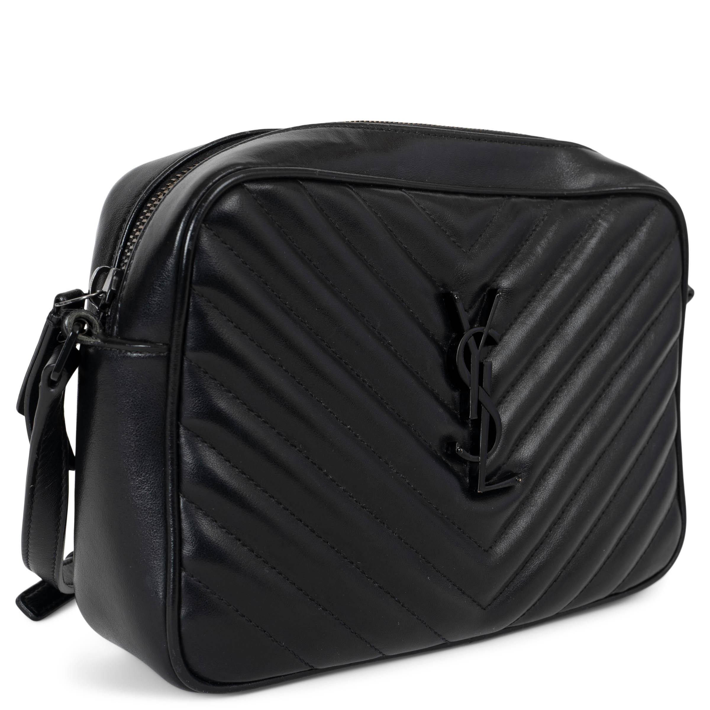 This 100% authentic Saint Laurent Lou Medium Camera Bag in black combines elegance with practicality. Crafted from high-quality smooth polished leather, this bag features signature quilted stitching and a sleek, adjustable shoulder strap for