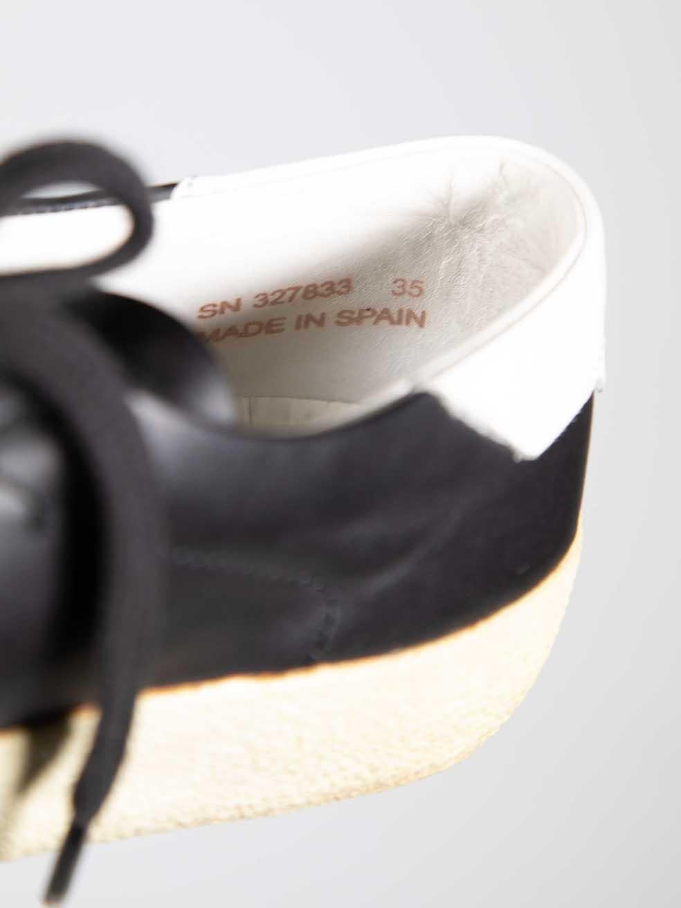 Saint Laurent Schwarze Leder-Turnschuhe mit niedrigem Oberteil Größe IT 35 im Angebot 6